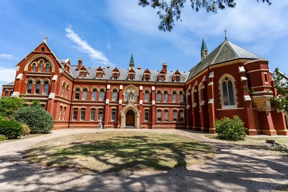 SALE, AUSTRALIA – December 21, 2019: Facade of the Catholic College Sale, Sion Campus, in Sale, Victoria, Australia SALE, AUSTRALIA – December 21, 2019: Facade of the Catholic College Sale, Sion Campus, in Sale, Victoria, Australia