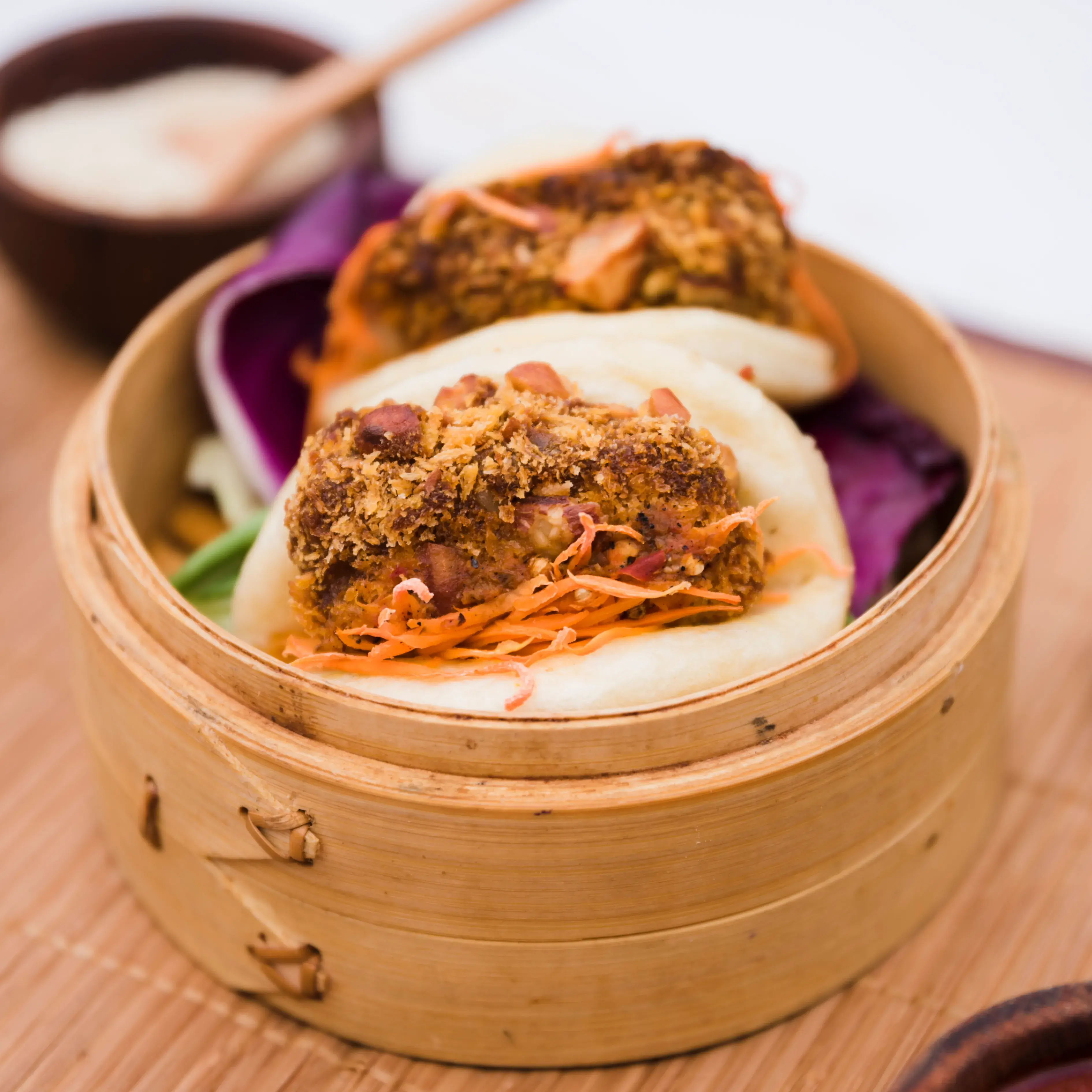 Close-up of traditional food gua bao in bamboo steamer Close-up of traditional food gua bao in bamboo steamer