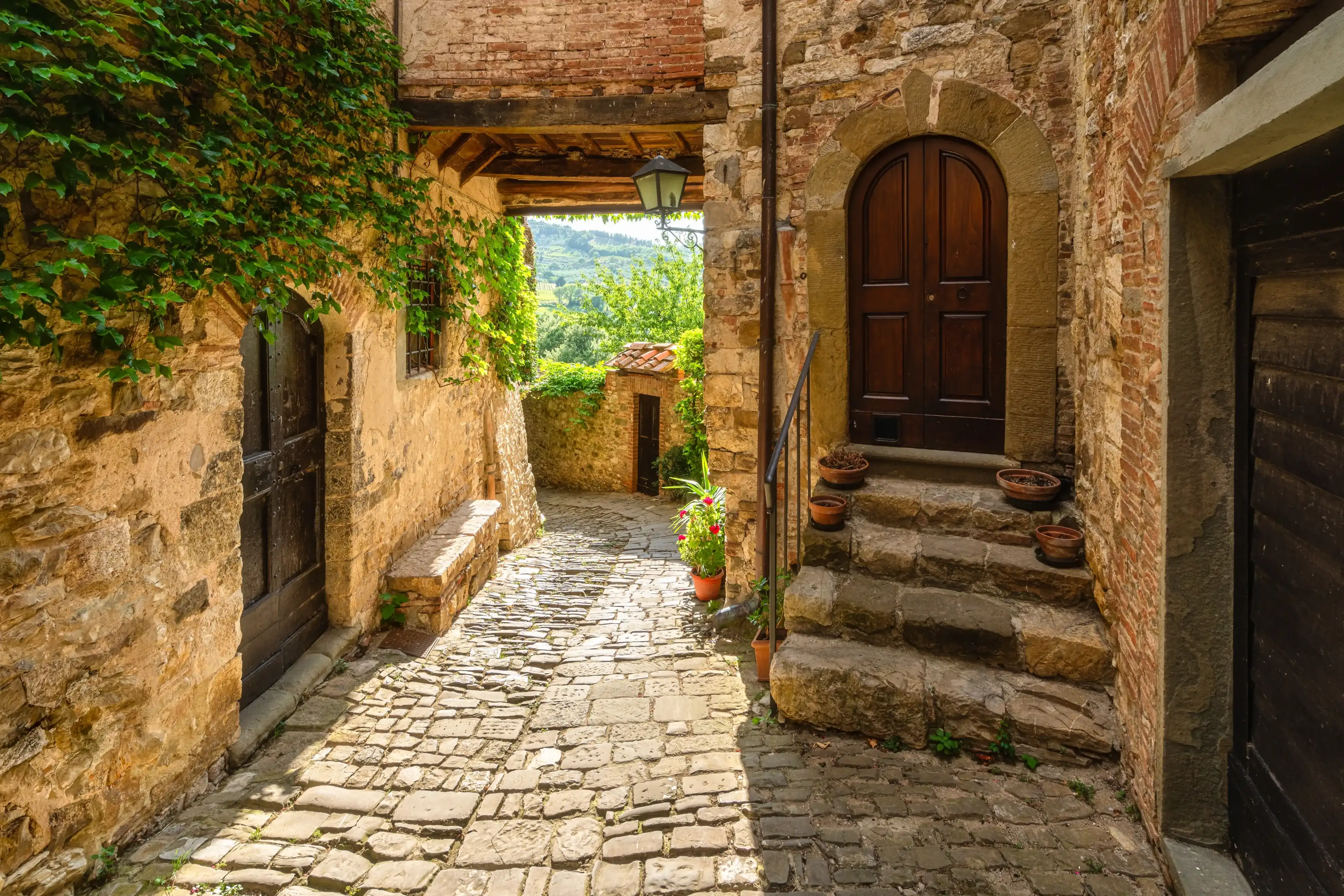 The picturesque village of Montefioralle, near Greve in Chianti, on a sunny summer day. Province of Florence, Tuscany, Italy. The picturesque village of Montefioralle, near Greve in Chianti, on a sunny summer day. Province of Florence, Tuscany, Italy.