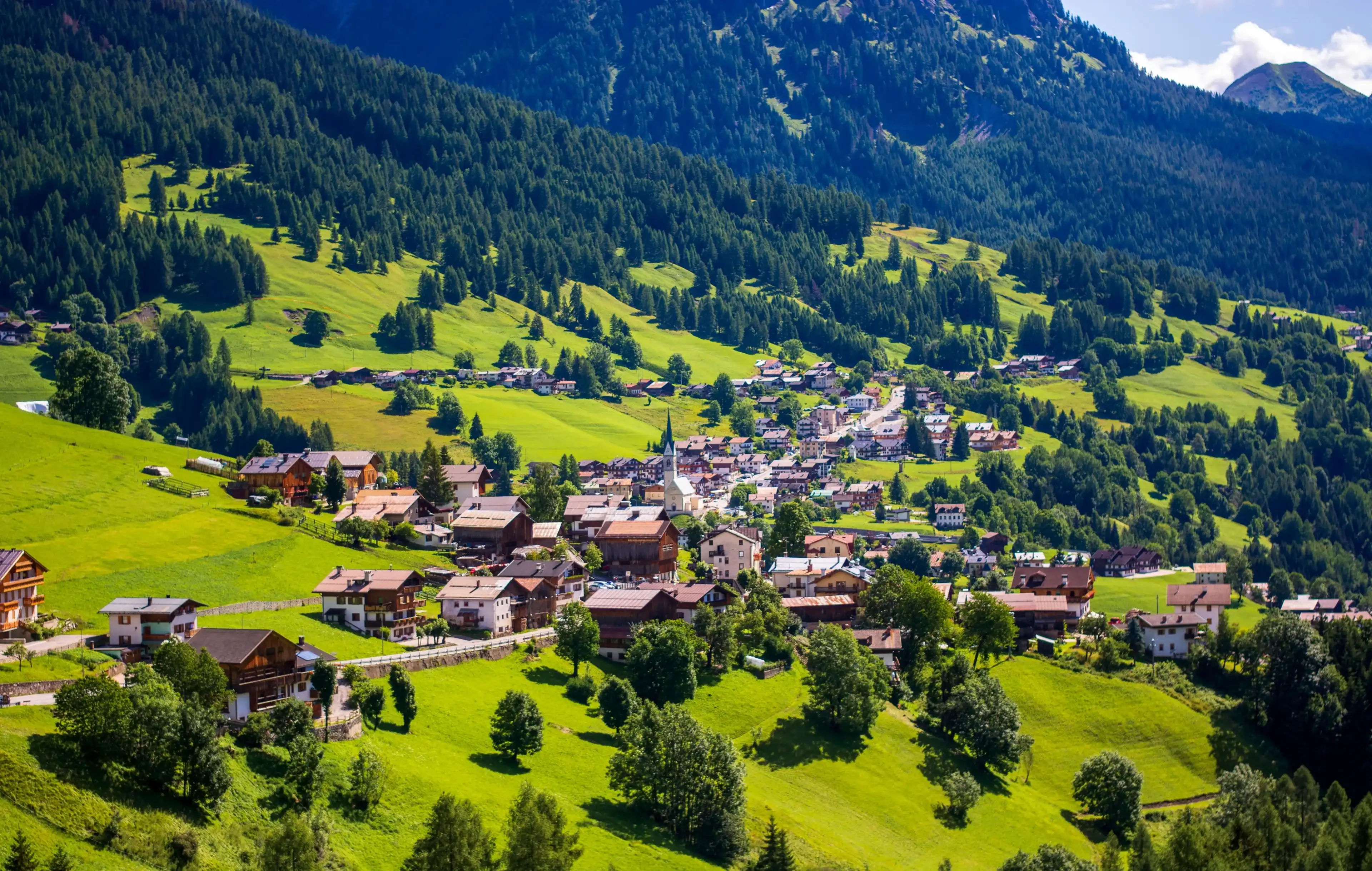 Selva di Cadore seen from above on a beautiful spring day Selva di Cadore seen from above on a beautiful spring day