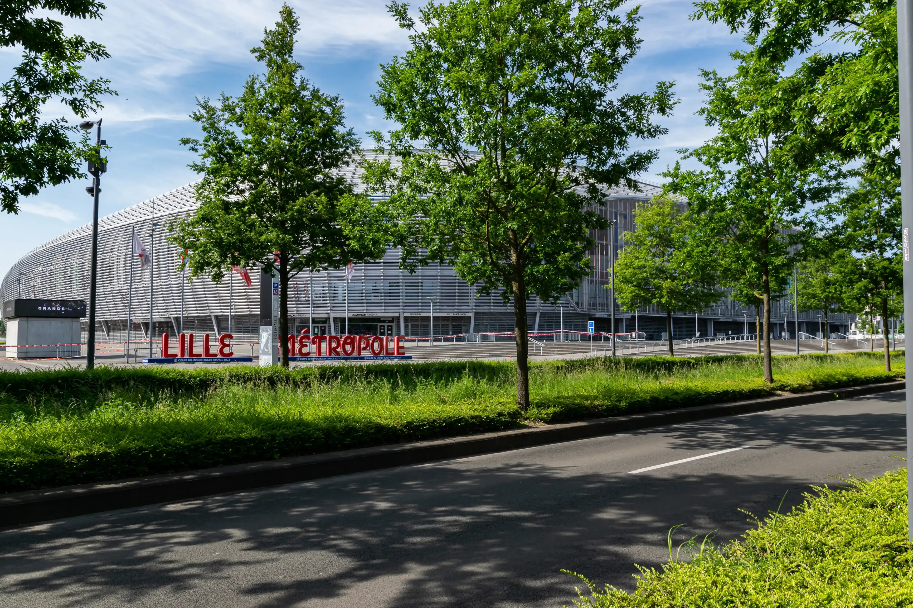 Villeneuve d'Ascq,FRANCE-May 28,2023:View of the inscription lille Metropole and stadium of the Losc Football Club: Decathlon Arena stade Pierre-Mauroy.Stadium in Villeneuve-d'Ascq near Lille.