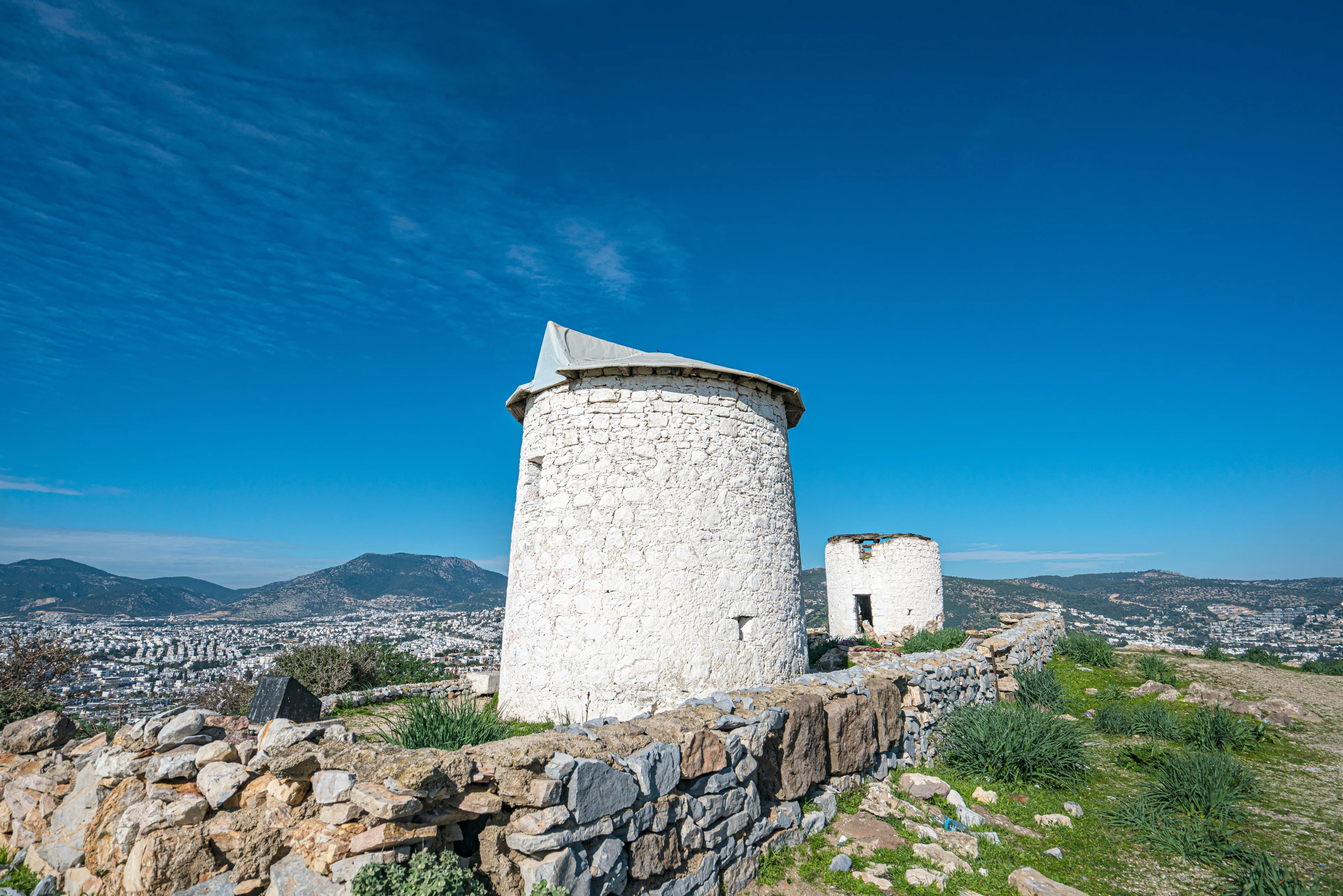 The windmills of Bodrum are a collection of stone buildings that were constructed in the 18th century and were used to grind grain into flour located on the hills between Bodrum and Gumbet, Yalikavak
