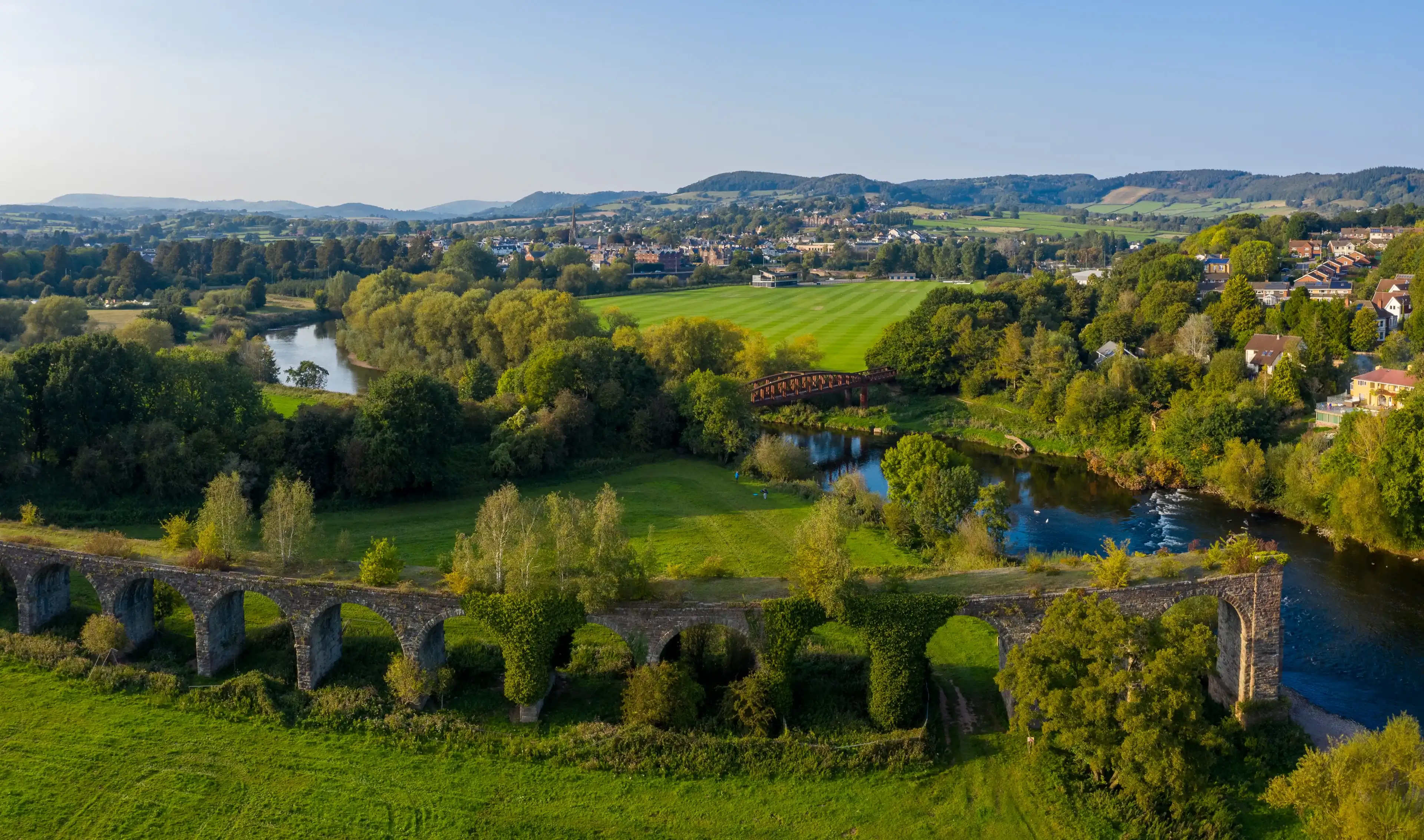 Monmouth Viaduct an old derelict railway viaduct bridge crossing the river Wye in Monmouthshire Wales. Monmouth Viaduct an old derelict railway viaduct bridge crossing the river Wye in Monmouthshire Wales.