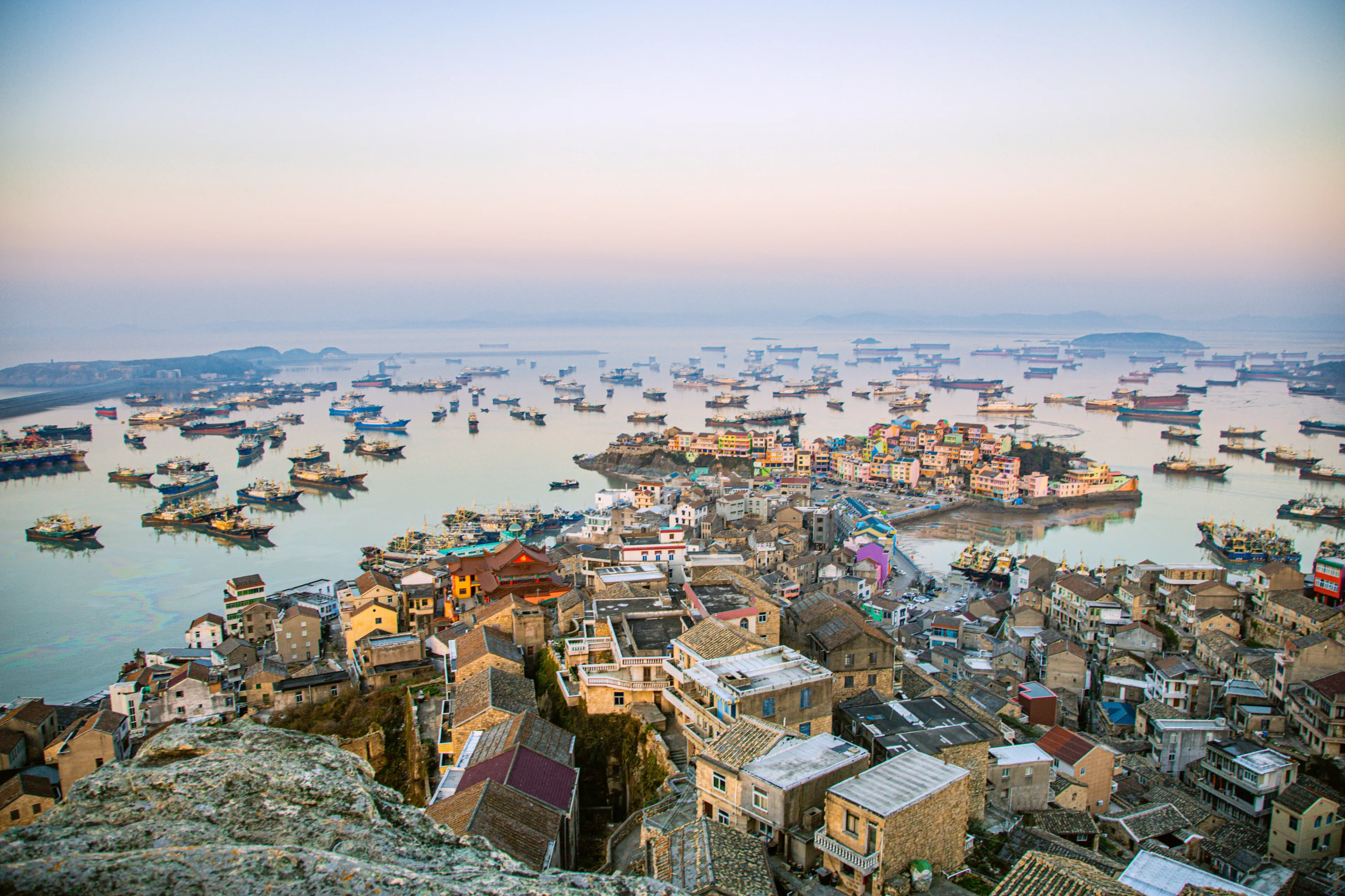 Xiaoruo Village, Wenling City, Taizhou City, Zhejiang Province - high angle view of fishing village and fishing port at sunrise