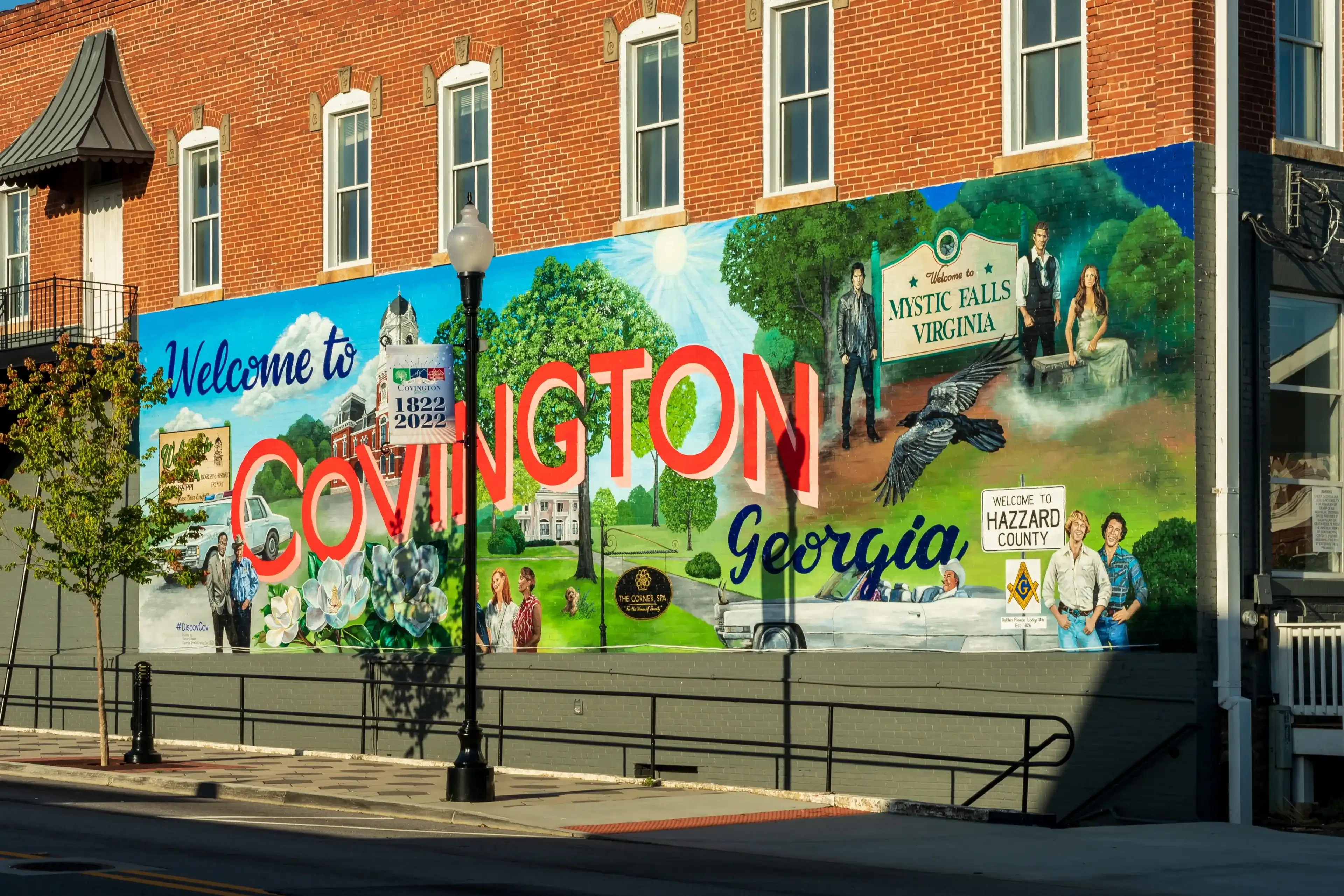 Covington Georgia USA July 31 2022 a painting on side of a building depicting local movies that have be filmed in Covington georgia Covington Georgia USA July 31 2022 a painting on side of a building depicting local movies that have be filmed in Covington georgia