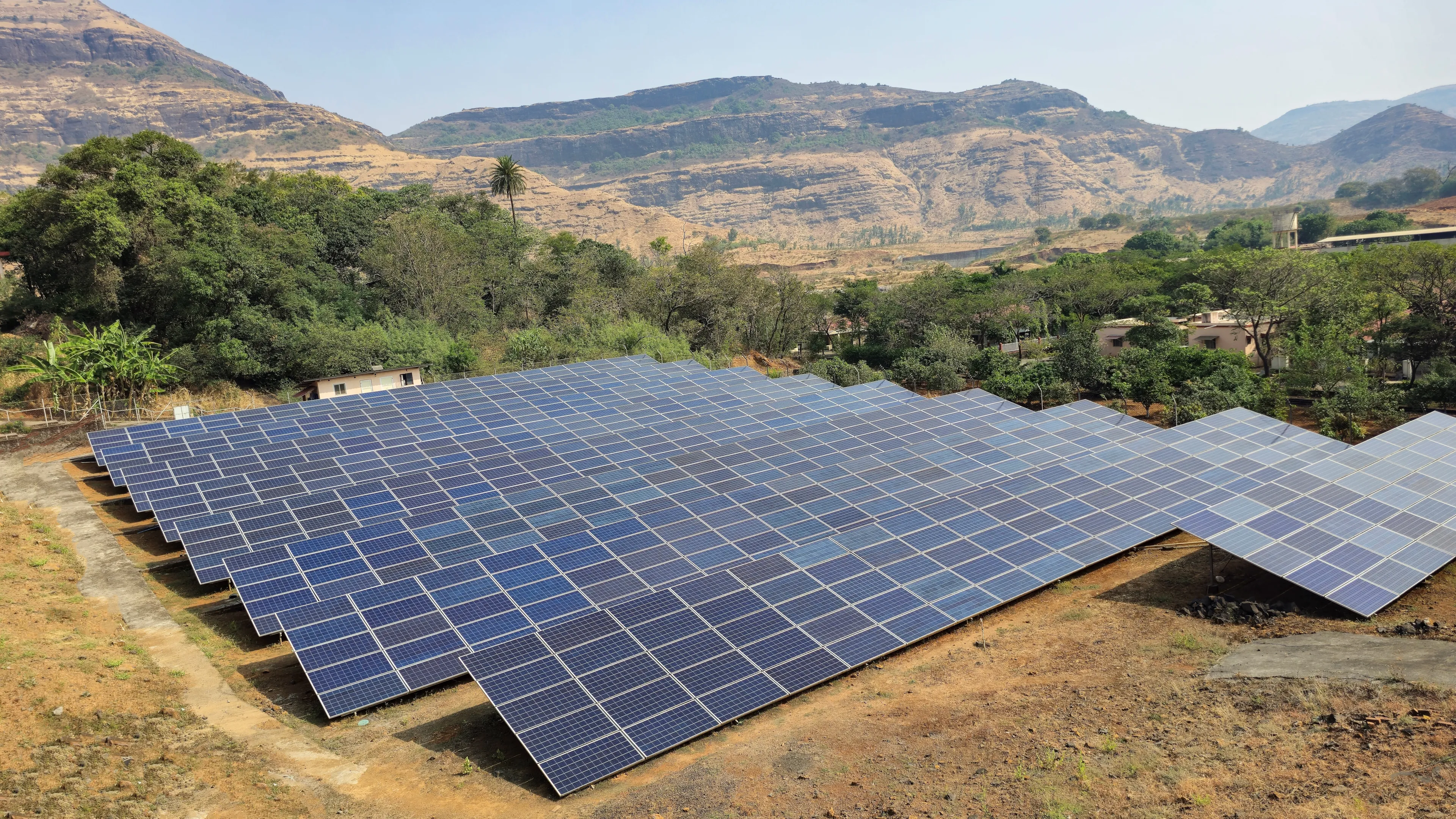  Solar panel system near mountain range in Igatpuri, Maharashtra India.