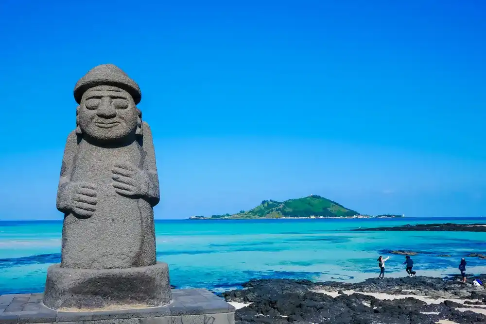 Stone Grandfather and beautiful sea scenery - Jeju Island, South Korea.