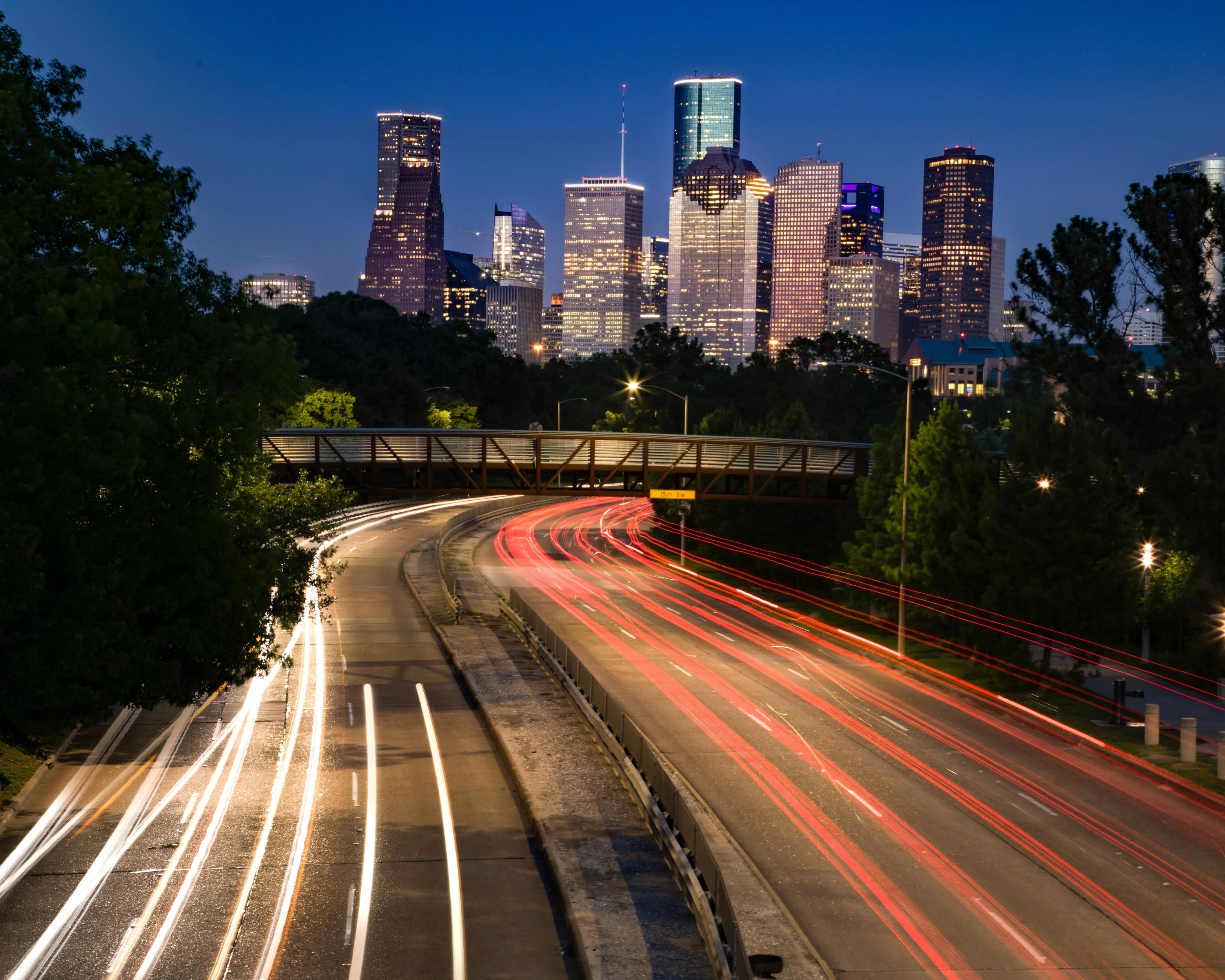An Aerial Photography of City Buildings at Night Near the Road
