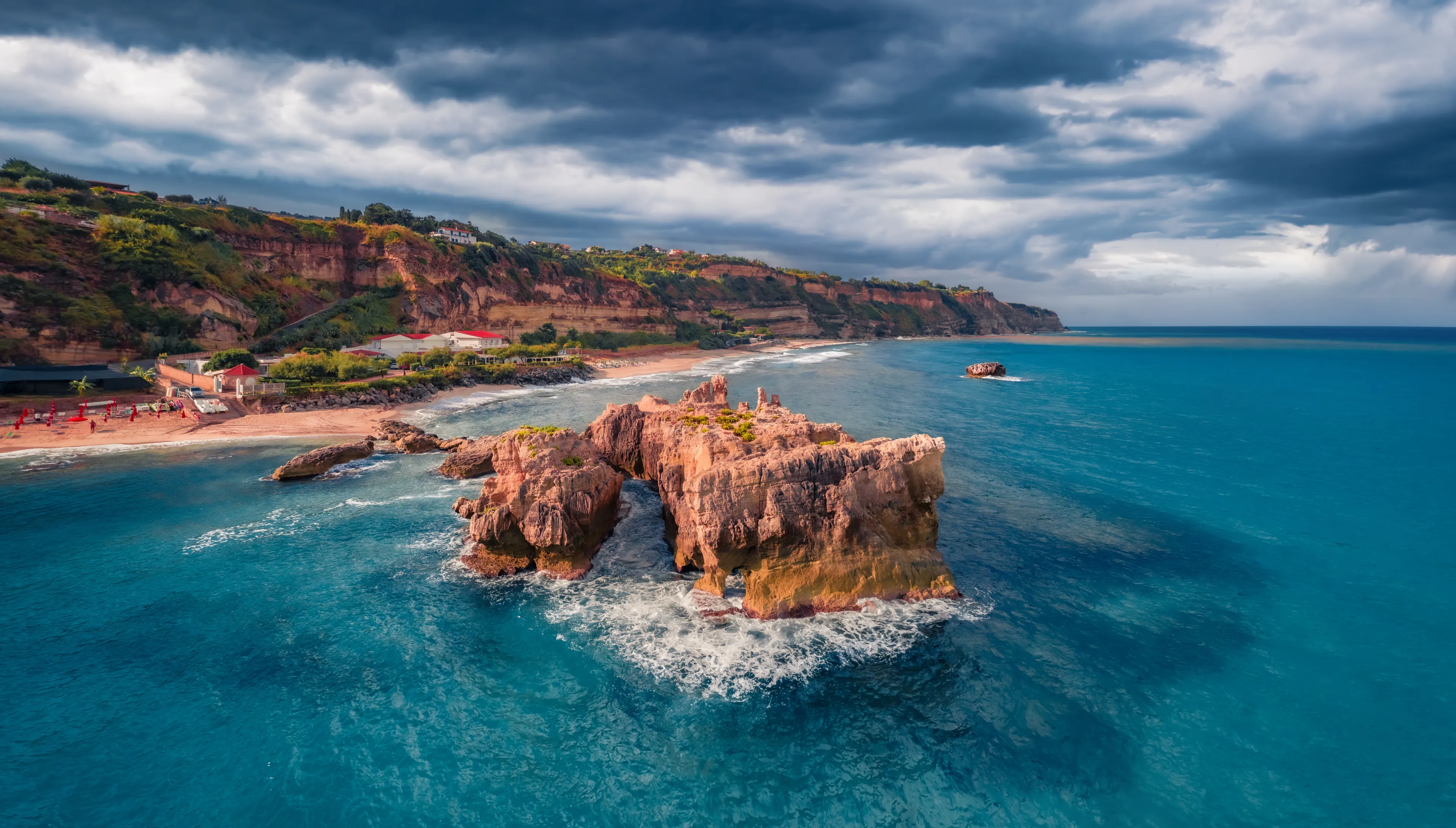 Dramatic summer view of Riachi rocks. Amazing morning scene of Riachi village; Province of Vibo Valentia, Italy; Europe. Aerial seascape of Mediterranean sea. Traveling concept background. 