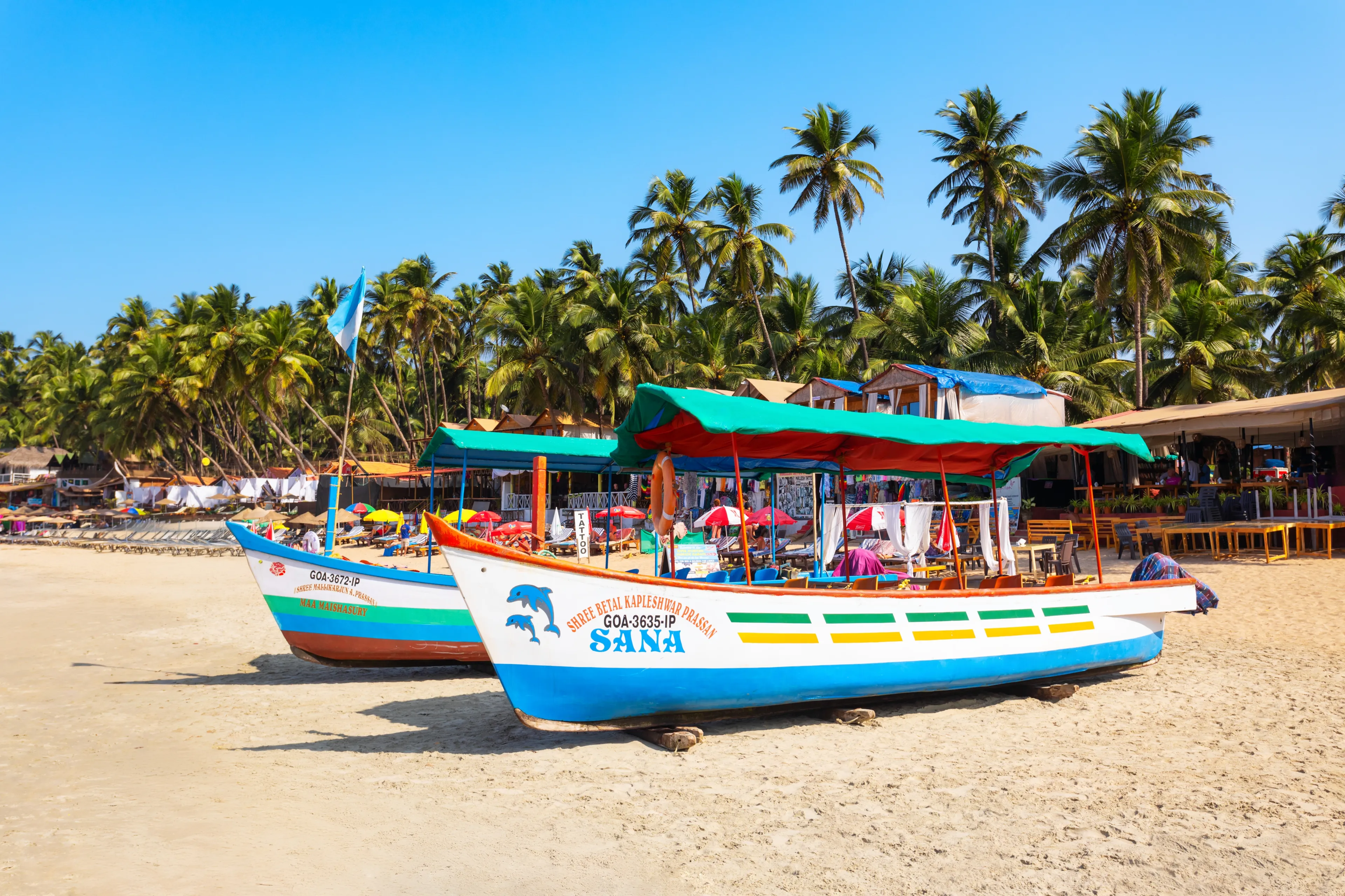 Palolem, India - January 06, 2023: Boats at the Palolem Beach. Palolem Beach is situated in Canacona region in southern Goa, India.
