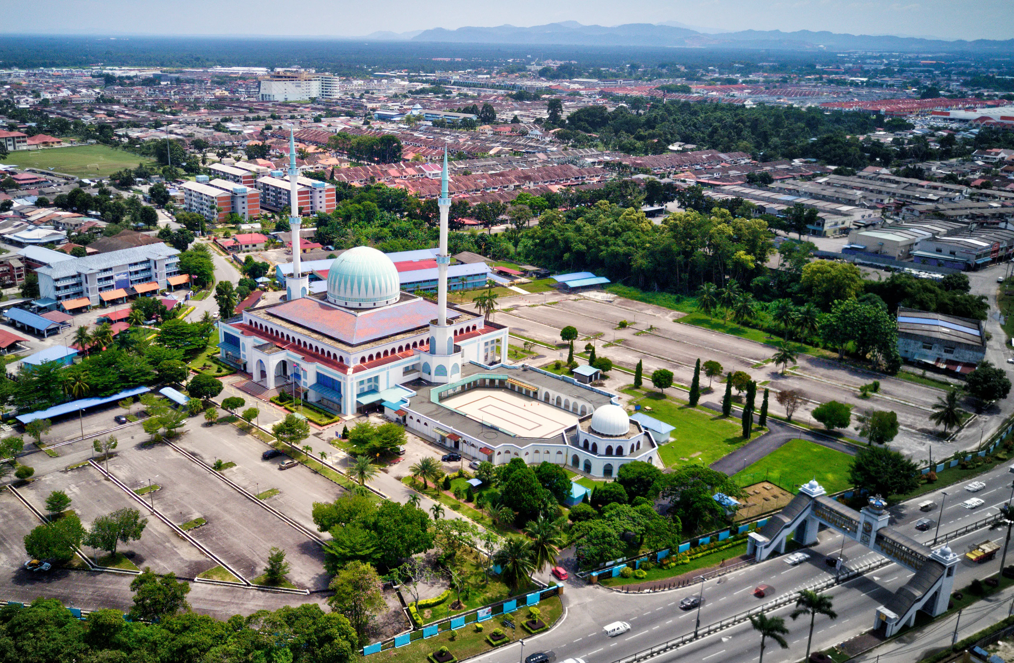 Muslim Mosque in aerial shot in Batu Pahat, Johor under the sunny day.