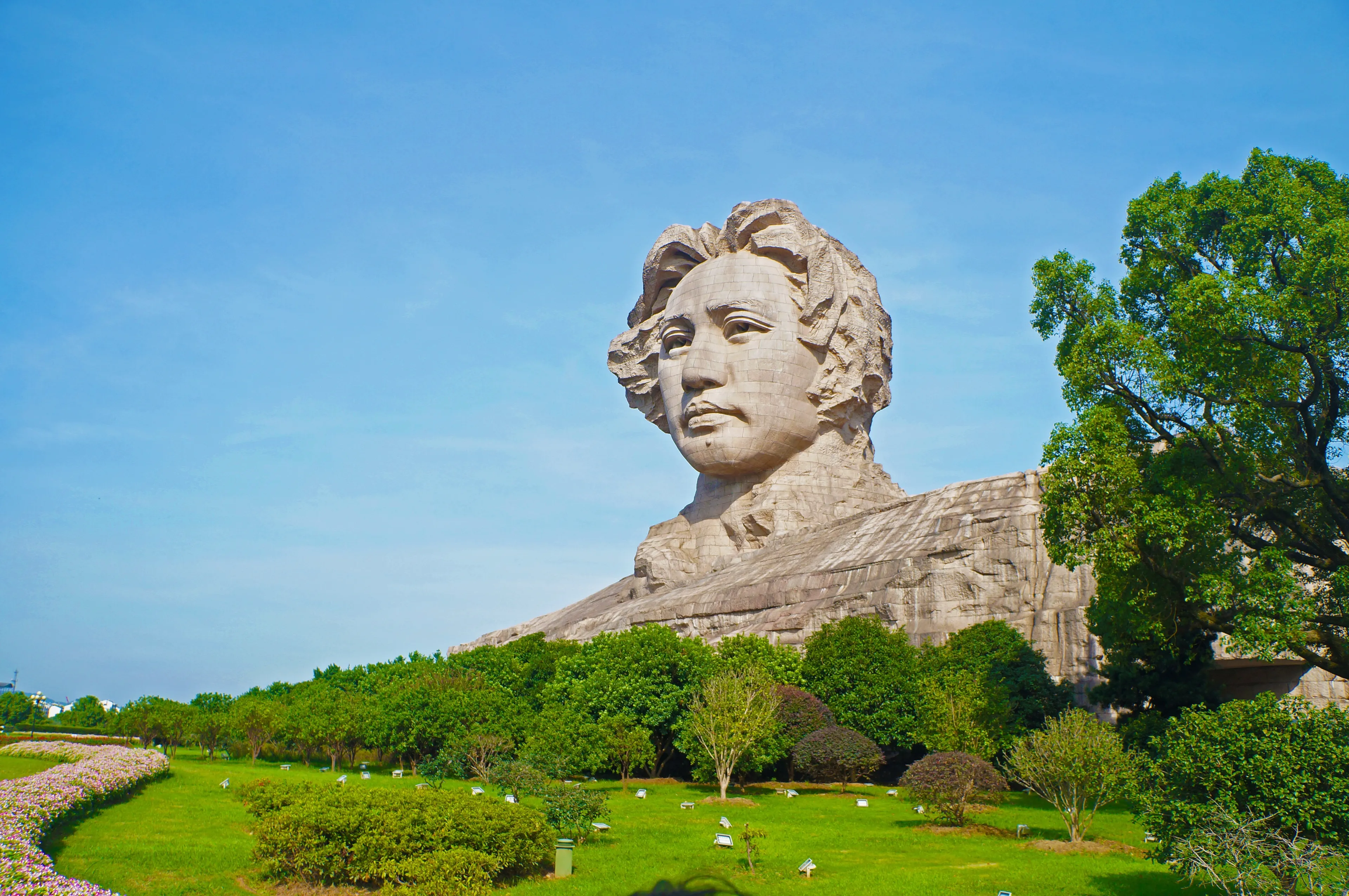 Changsha, China - Sep 25, 2017 : Youth Mao Zedong statue is located in Orange Isle. Changsha City, Hunan Province