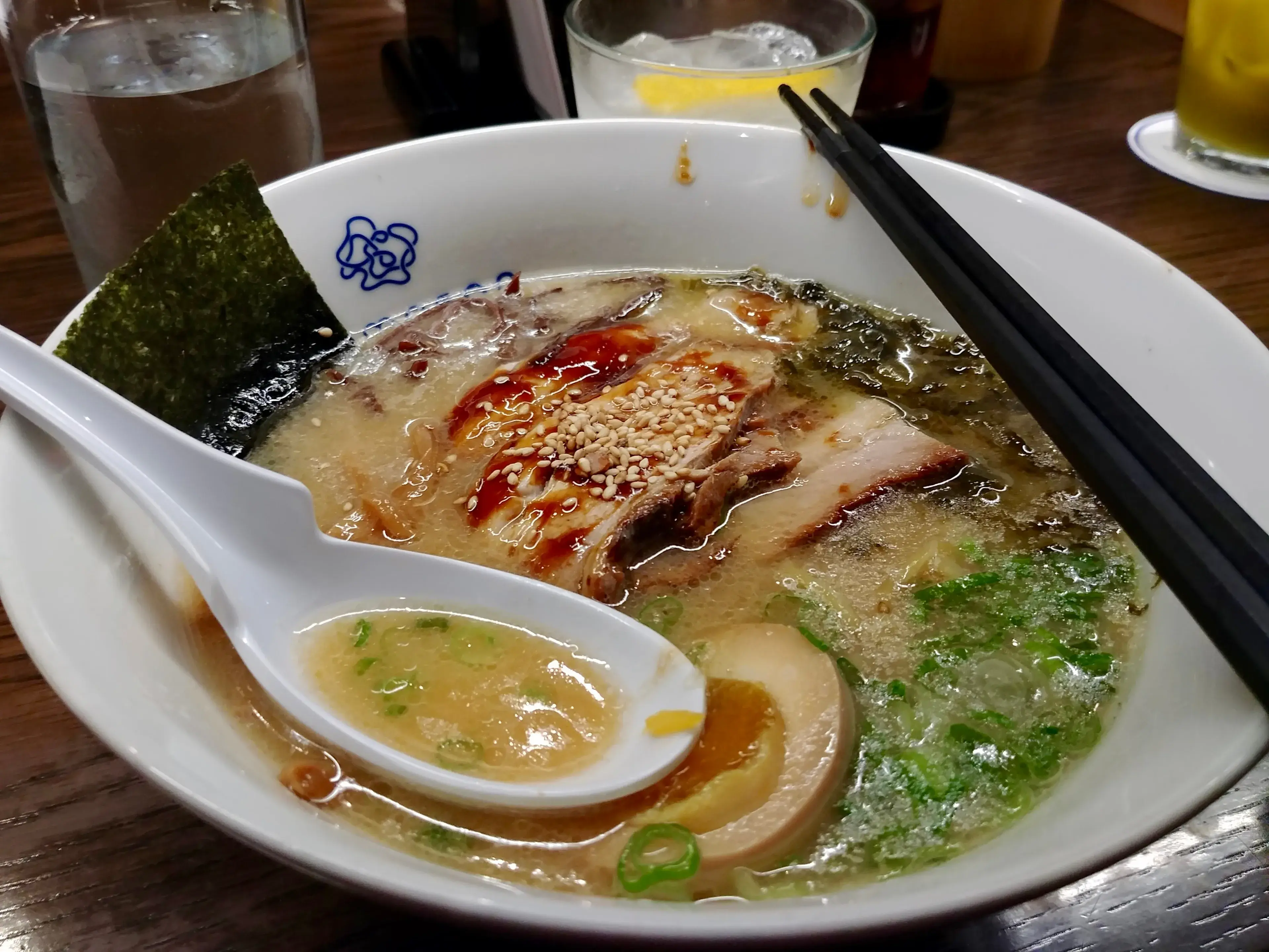 A half-eaten bowl of ramen noodles at a Japanese restaurant in New York City A half-eaten bowl of ramen noodles at a Japanese restaurant in New York City