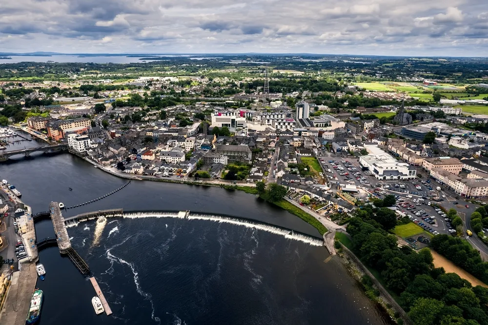 Athlone, Ireland - 07.14.2022: Aerial view on town center. Popular area with rich history and shopping centers and fine hotels and fine restaurants. Irish town.
