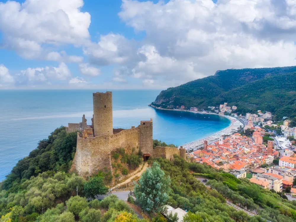 Aerial view of Monte Ursino Castle in the old village of Noli on the Italian Riviera. Noli, Ligury, Italy