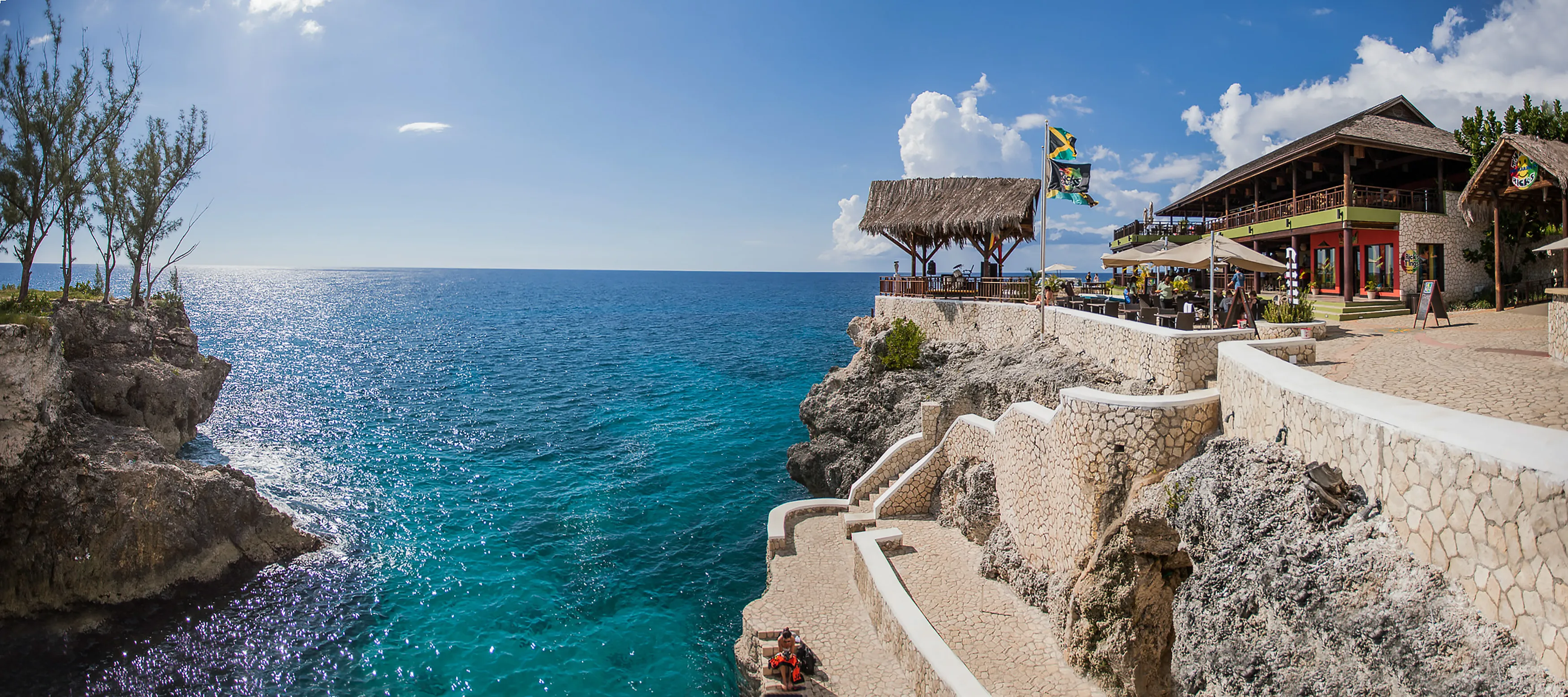 Negril, Jamaica - 11/25/2013: Famous Ricks restaurant in Negril Jamaica cliff jumping attraction day
