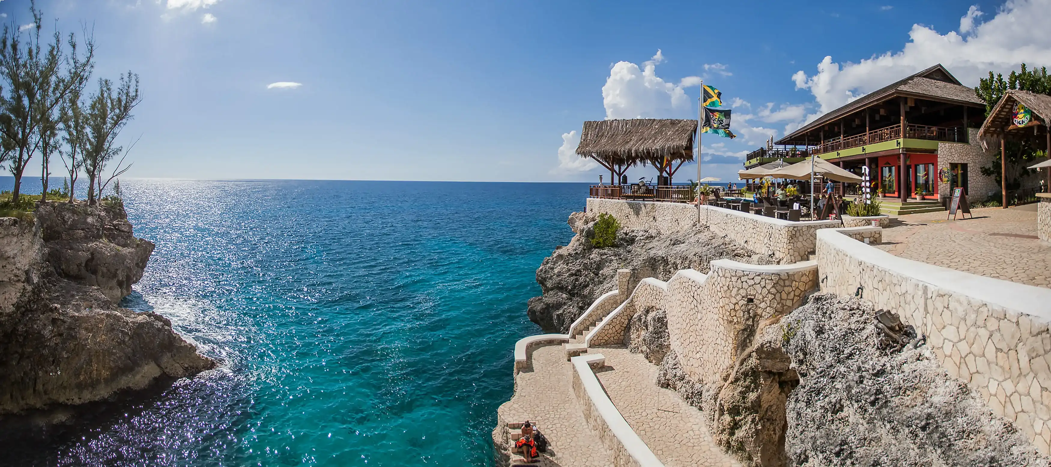 Negril, Jamaica - 11/25/2013: Famous Ricks restaurant in Negril Jamaica cliff jumping attraction day