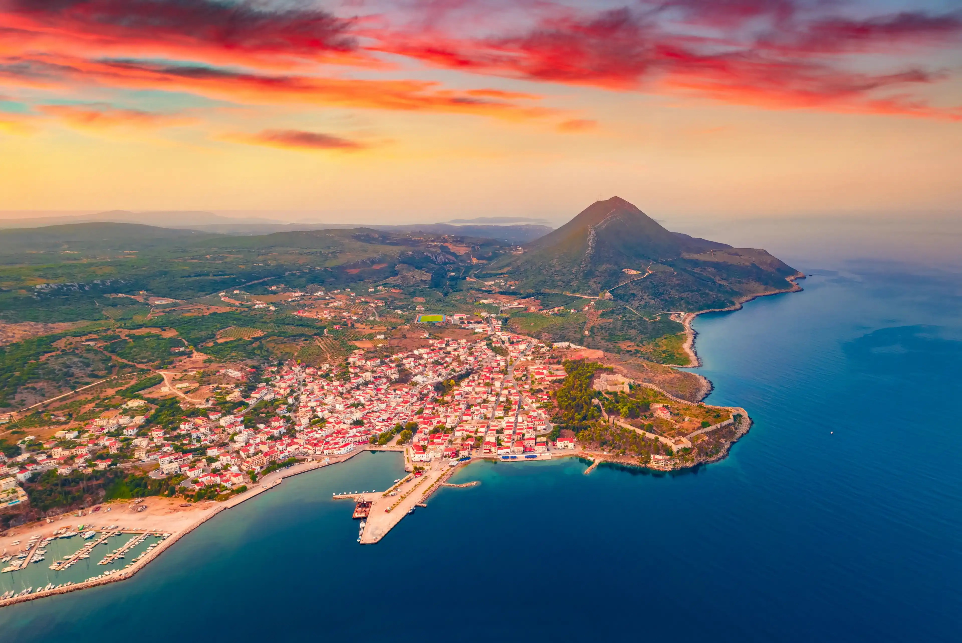 Wonderful summer view from flying drone of Pylos Castle. Spectacular summer cityscape of Pylos, Greece, Europe. Perfect sunrise on Peloponnese peninsula. Traveling concept background. Wonderful summer view from flying drone of Pylos Castle. Spectacular summer cityscape of Pylos, Greece, Europe. Perfect sunrise on Peloponnese peninsula. Traveling concept background.