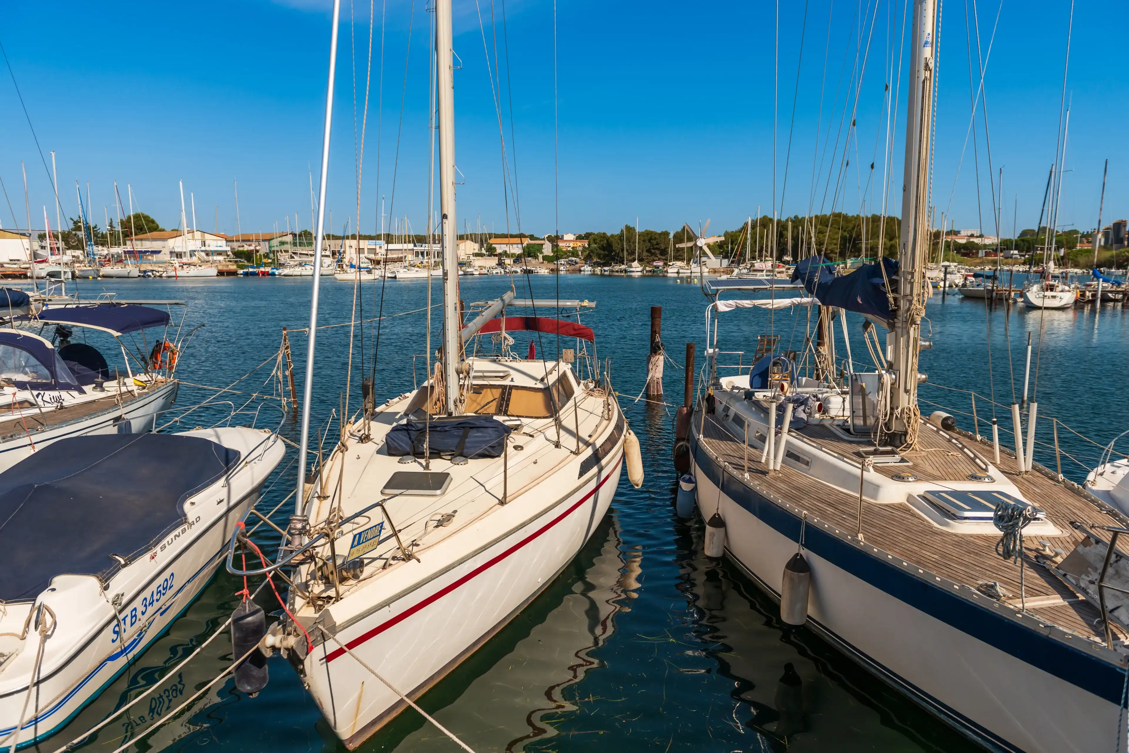 June 14, 2022: Sailboats moored in the marina of Balaruc les Bains, on the pond of Thau, in Occitanie, France June 14, 2022: Sailboats moored in the marina of Balaruc les Bains, on the pond of Thau, in Occitanie, France