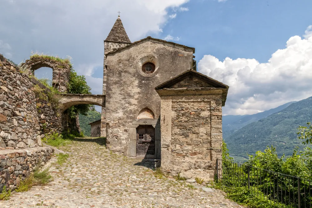 Tirano. The church of Santa Perpetua. It was a set of structures intended for the reception of travelers, of which only the church remains. 12th century. Province of Sondrio. Northern Italy