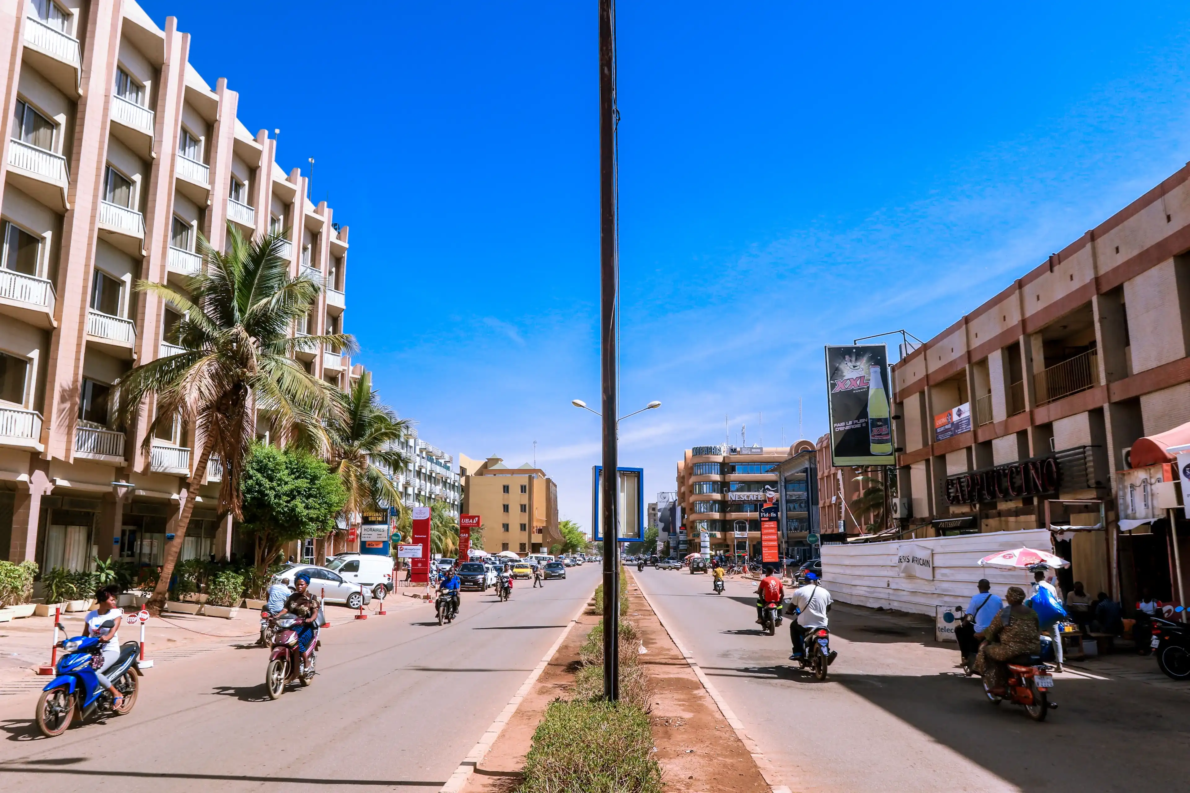 Burkina Faso, Ouagadougou - August 23, 2018: View to the Road, Cappuccino restaurant and the Splendid Hotel in the heart of City Center