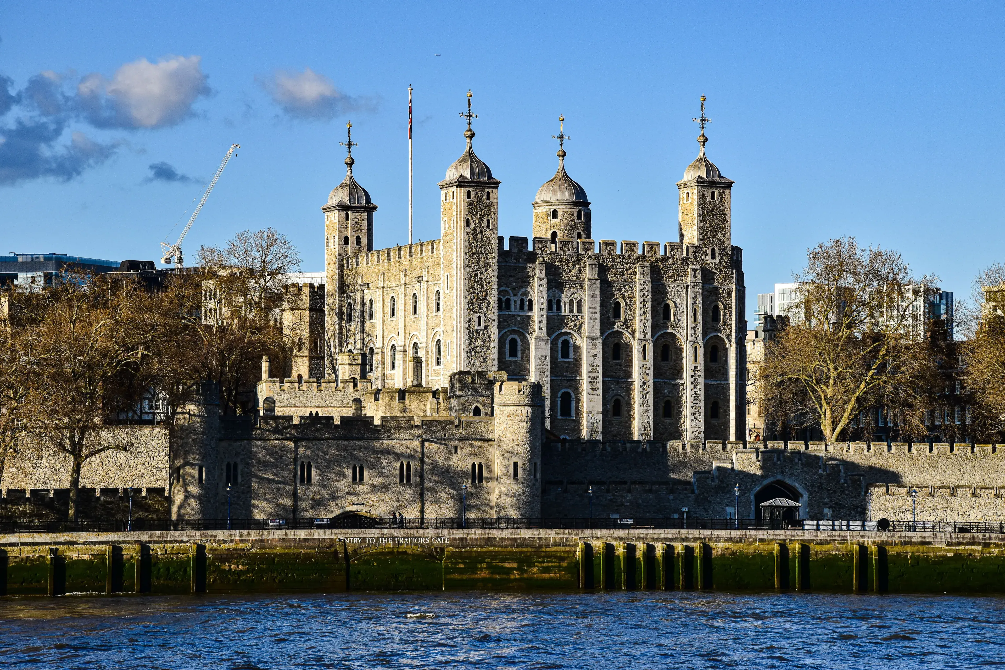 Stunning view of the Tower of London with a clear blue sky, capturing the historic landmark's details. Stunning view of the Tower of London with a clear blue sky, capturing the historic landmark's details.
