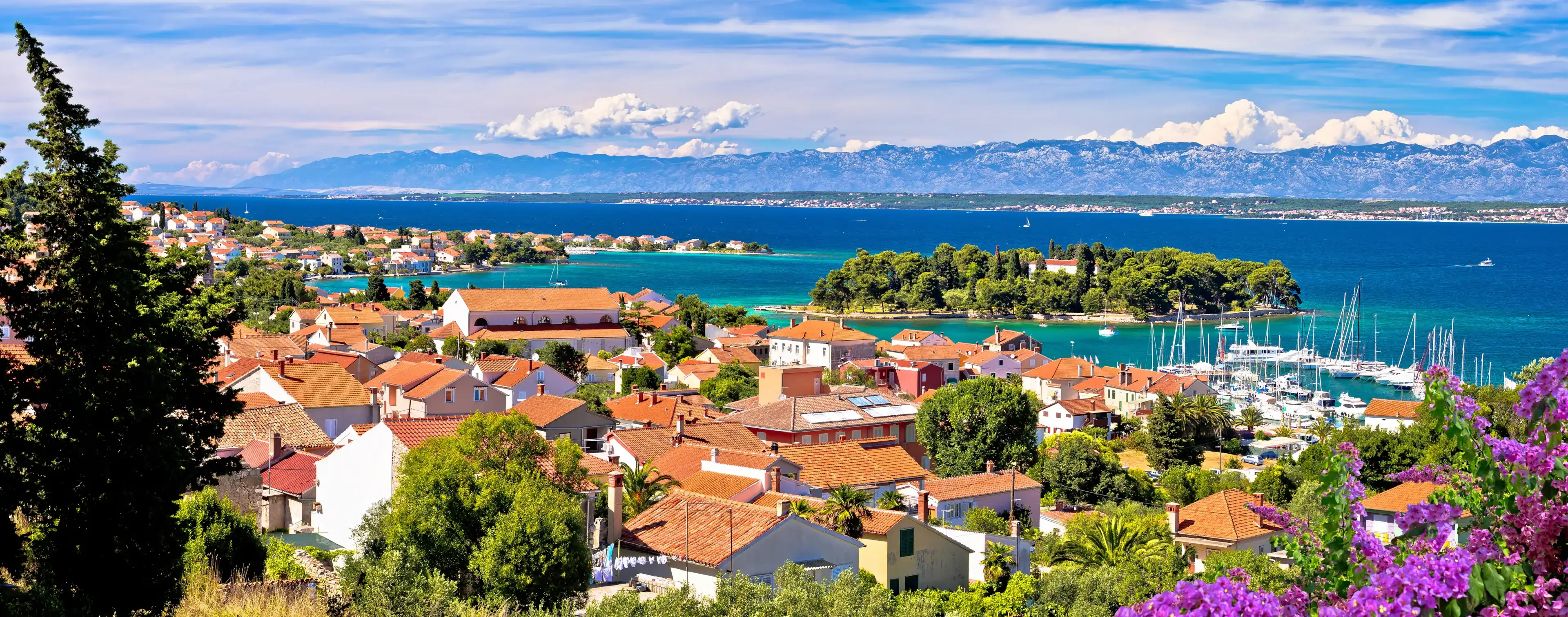 Zadar archipelago. Island of Ugljan waterfront and Galovac islet panoramic view, Preko in Dalmatia region of Croatia
