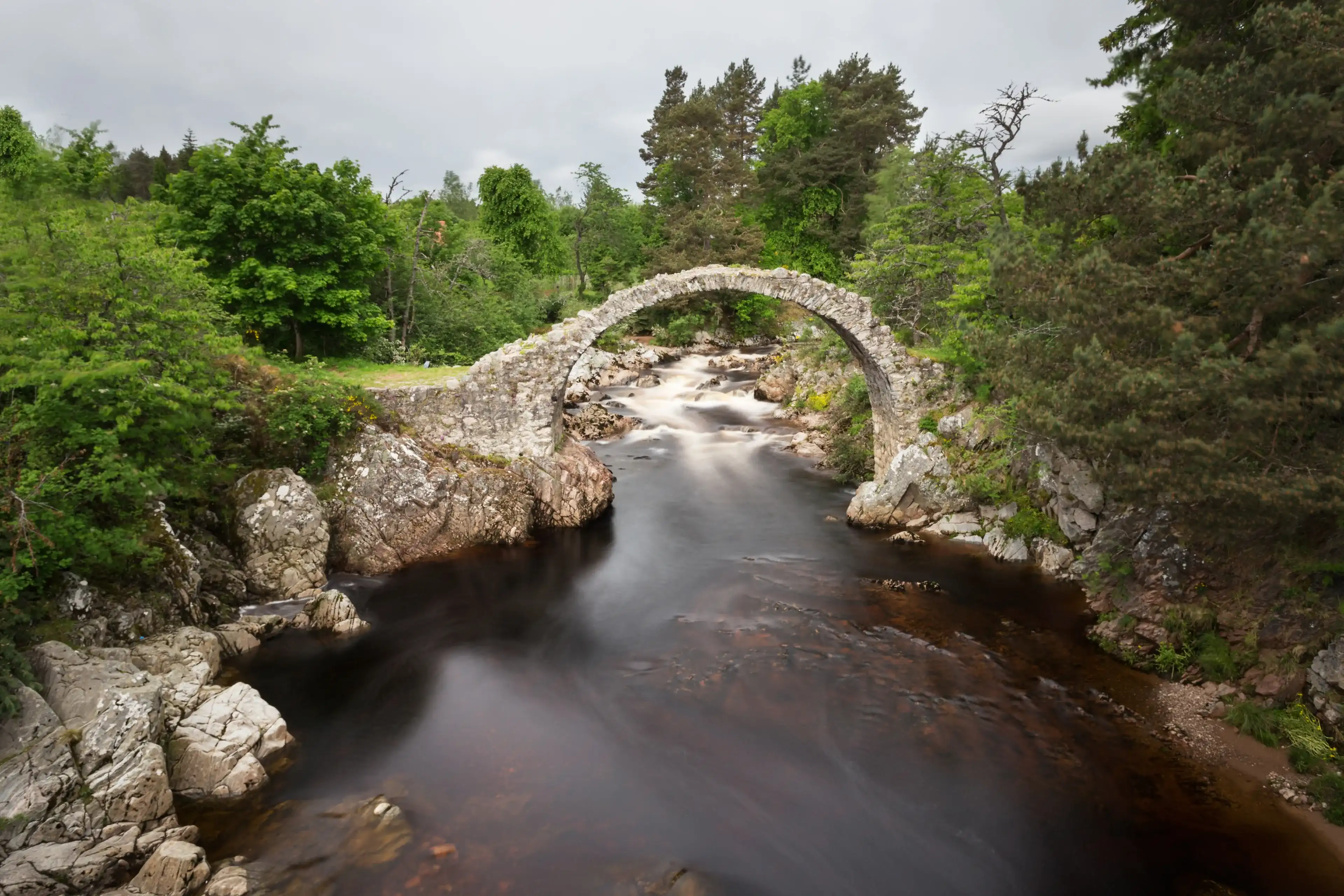 The Old Packhorse Bridge, Carrbridge by Aviemore, Scotland The Old Packhorse Bridge, Carrbridge by Aviemore, Scotland