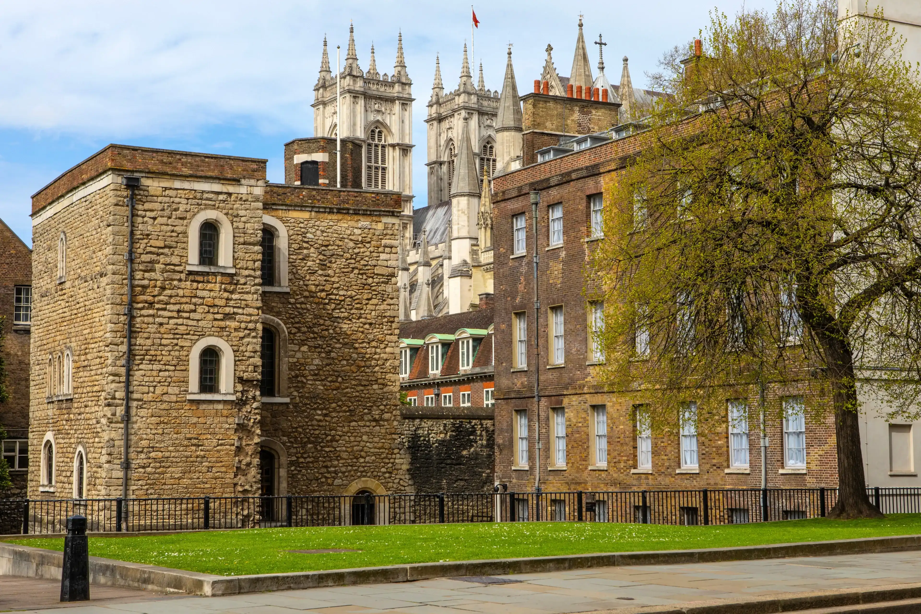 The historic Jewel Tower with Westminster Abbey in the background, in the City of Westminster, London, UK. The historic Jewel Tower with Westminster Abbey in the background, in the City of Westminster, London, UK.