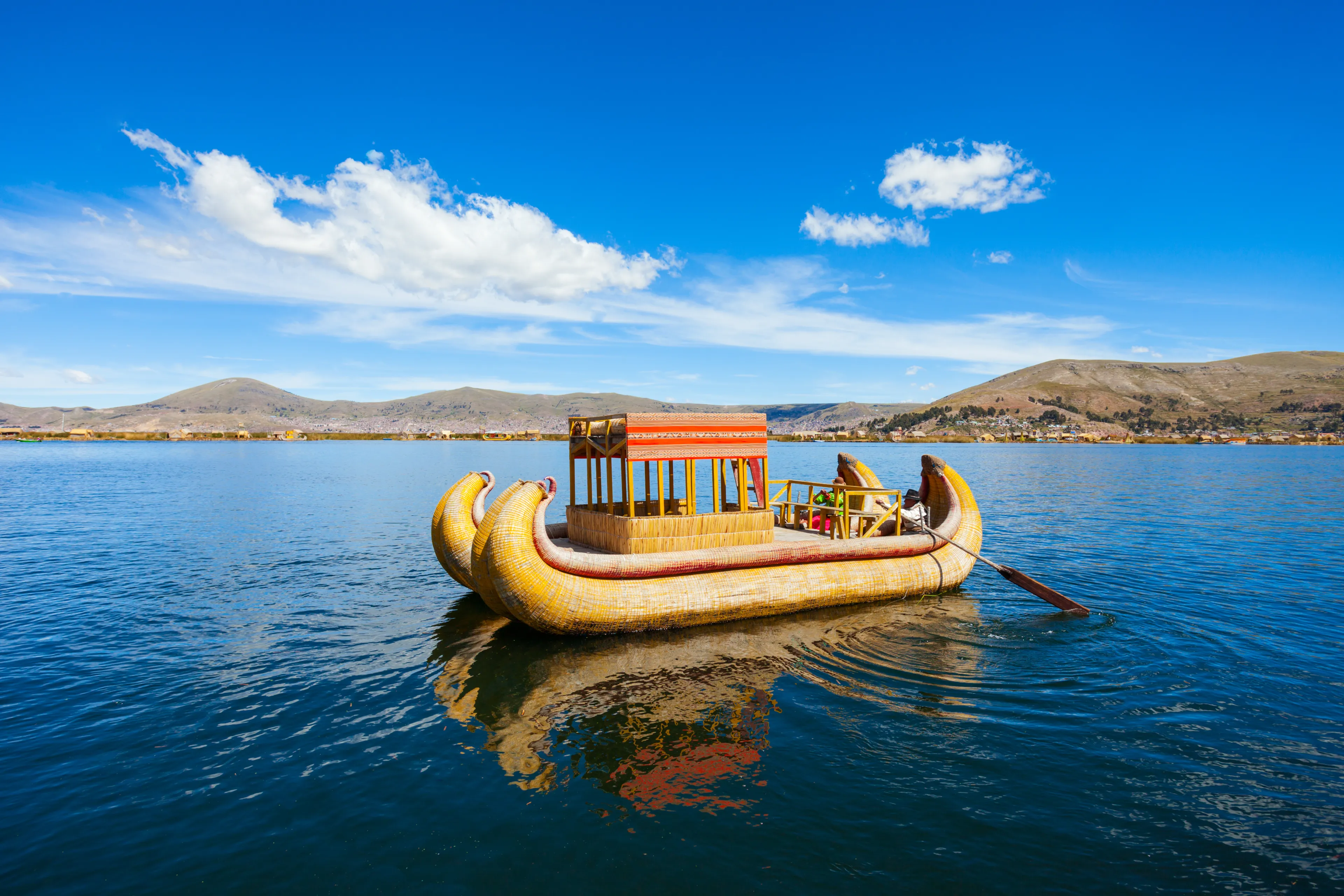 Totora boat on the Titicaca lake near Puno, Peru