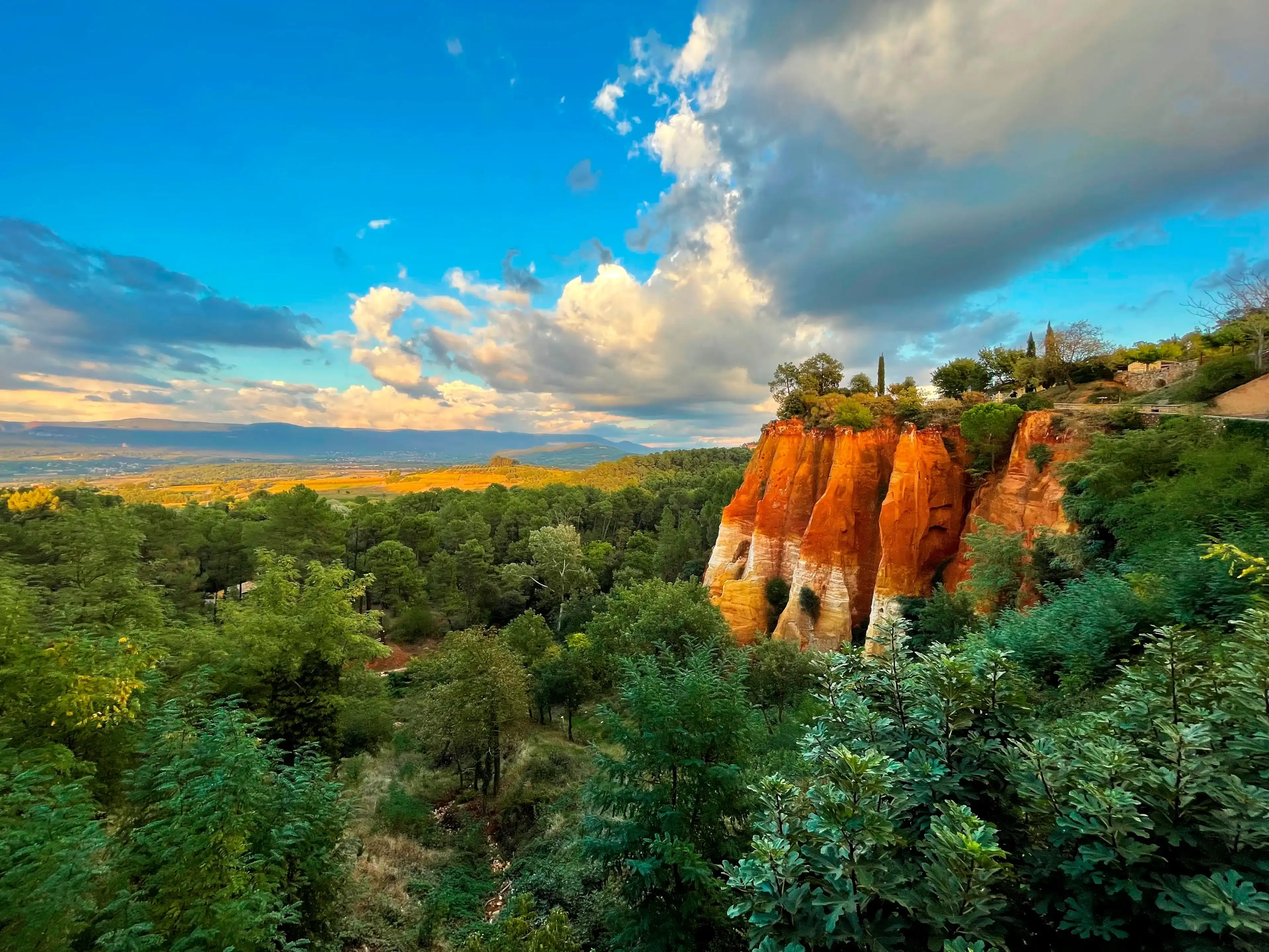Roussillon's Ochre Cliffs. Nature's canvas painted with Provence's vivid hues. Roussillon's Ochre Cliffs. Nature's canvas painted with Provence's vivid hues.