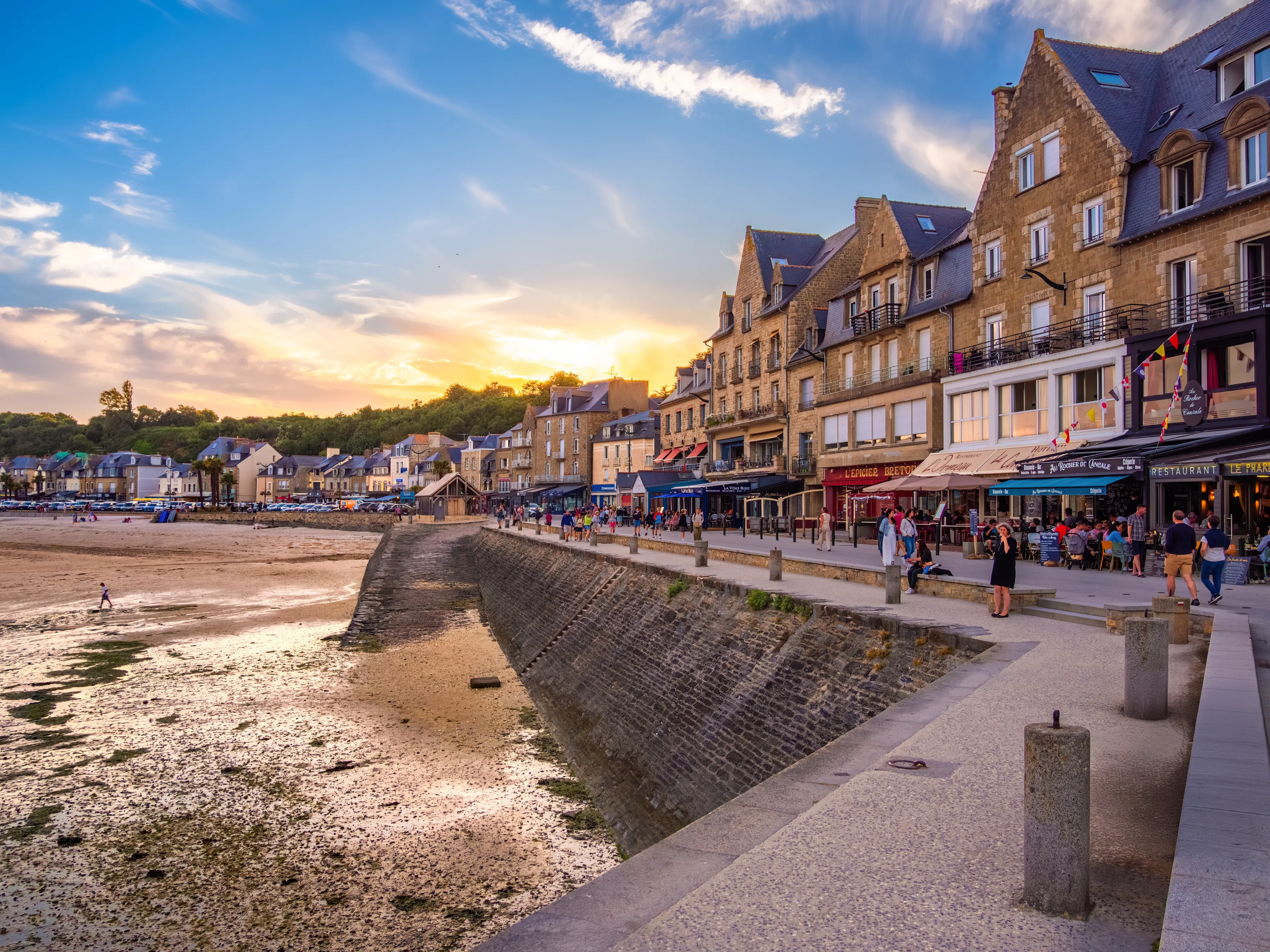 Cancale, France - July 19, 2024: Serene coastal village of Cancale in french Brittany at sunset.