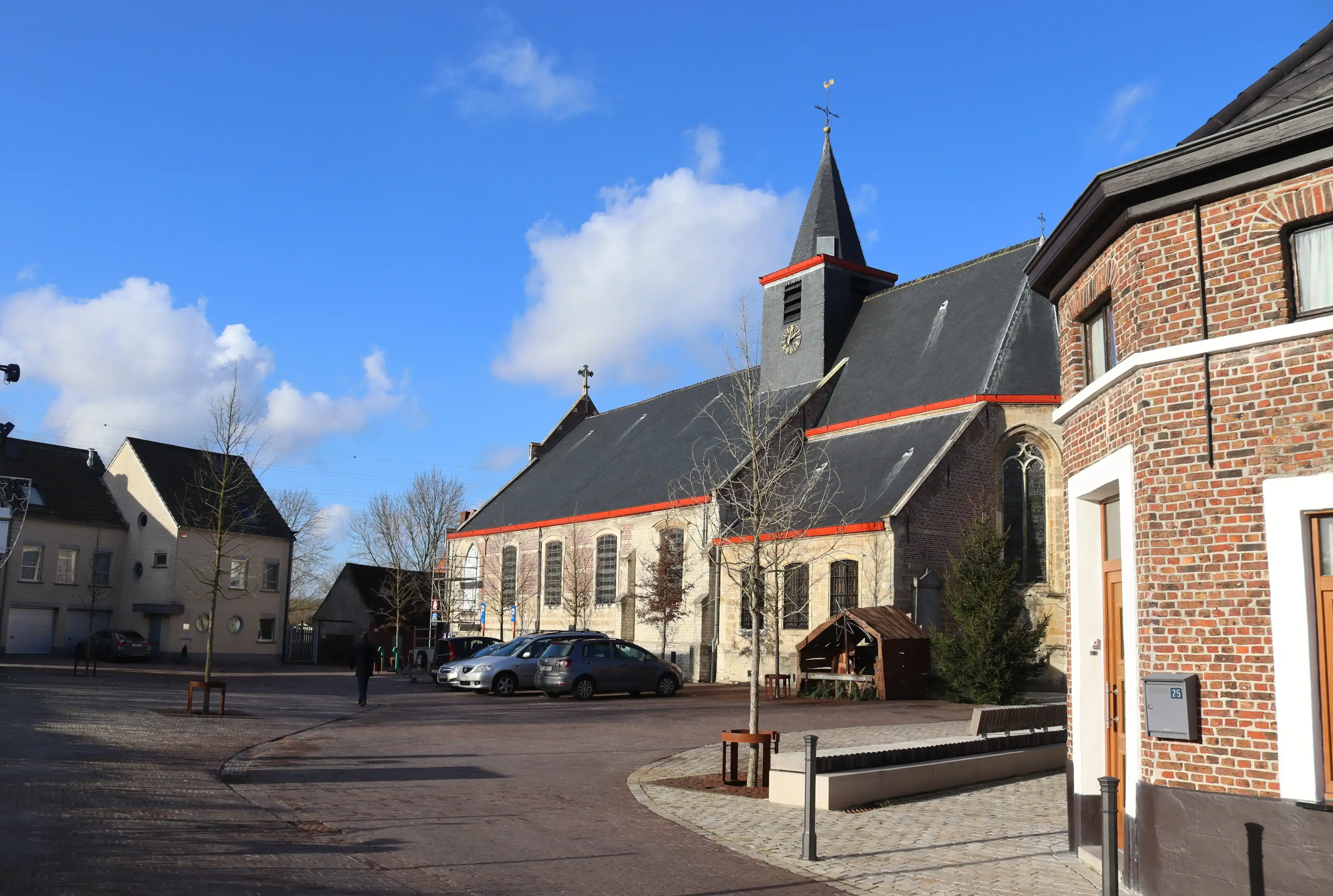 LEBBEKE, BELGIUM, 6 JANUARY 2022: The village center and church of Denderbelle near Lebbeke in Flanders. Denderbelle is a village in East Flanders next to the river Dender with a population of 2200.