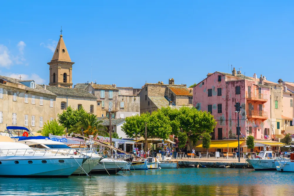 SAINT FLORENT, CORSICA ISLAND - JUN 30, 2015: a view of small port of Saint Florent with sailing boats, Corsica island, France.
