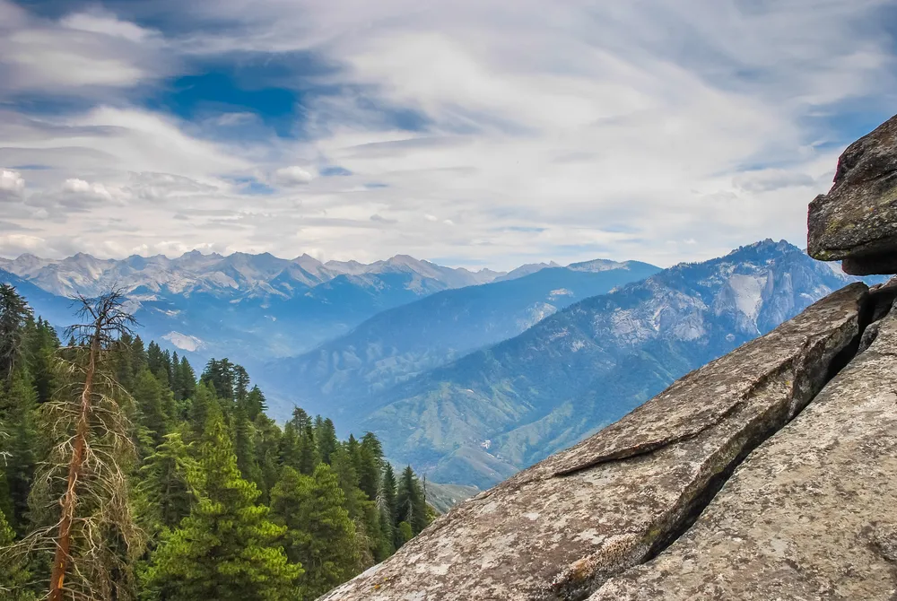 A rocky platform with a view into the distant mountains, taken in the Giant Forest of Sequoia National Park in Tulare County, California. taken in 2007