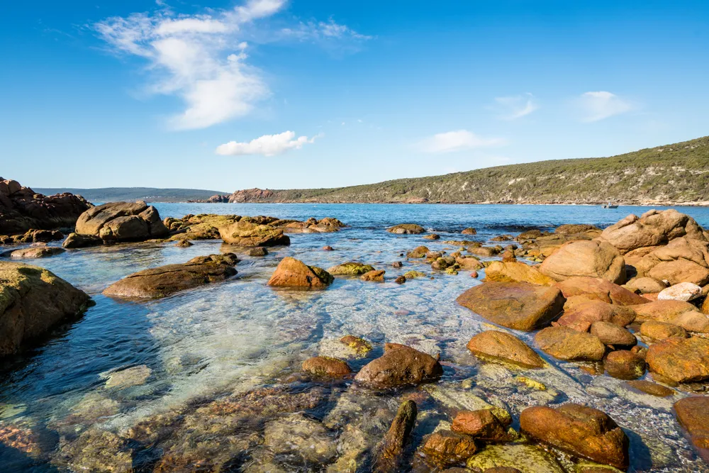 Rockpool and blue summer sky at Canal Rocks between the towns of Dunsborough and Margaret River in the South West of Western Australia, Australia.