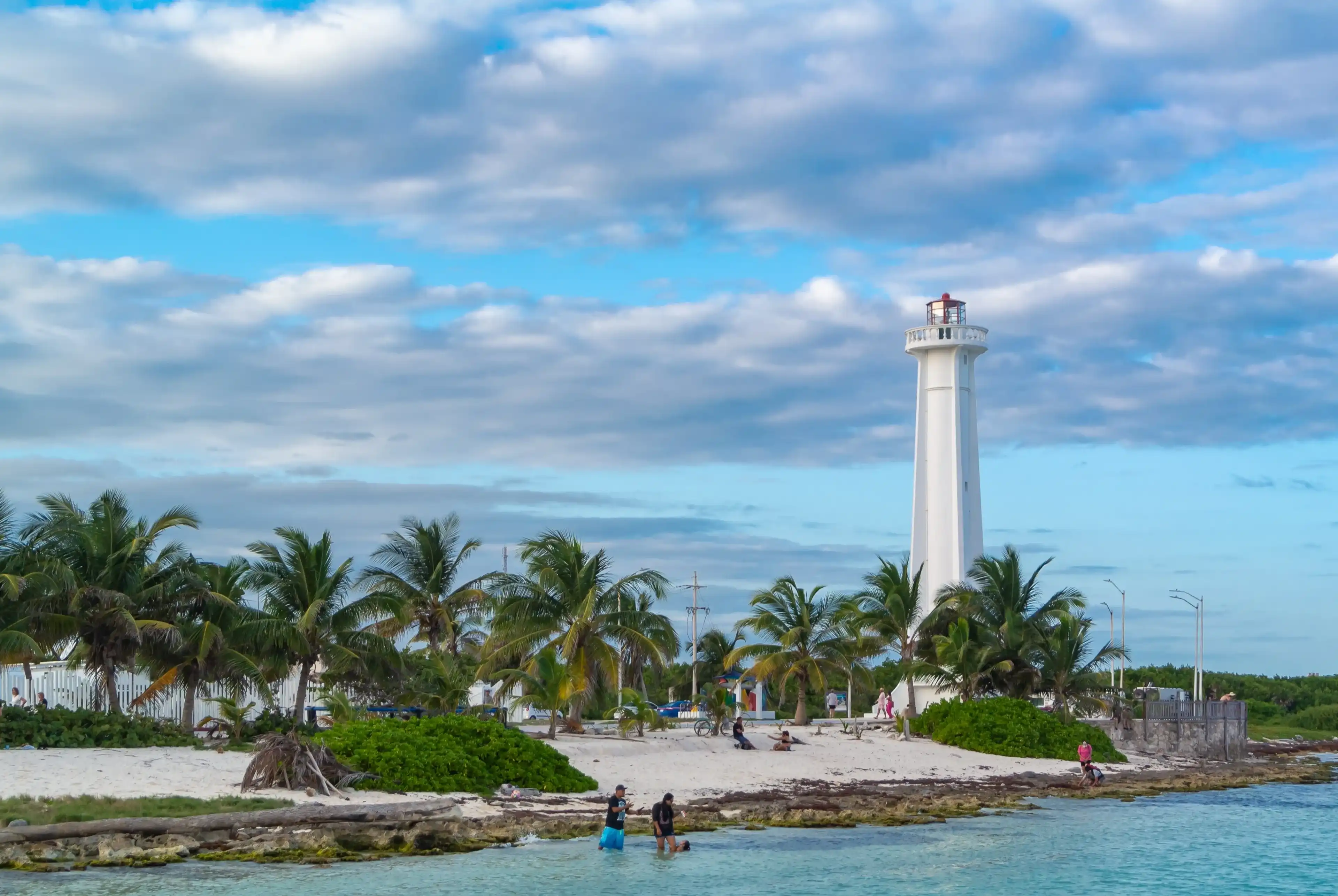 Mahahual, Quintana Roo, Mexico, 10th of Feburary 2023, A landscape with a lighthouse on a beach of Caribbean sea Mahahual, Quintana Roo, Mexico, 10th of Feburary 2023, A landscape with a lighthouse on a beach of Caribbean sea