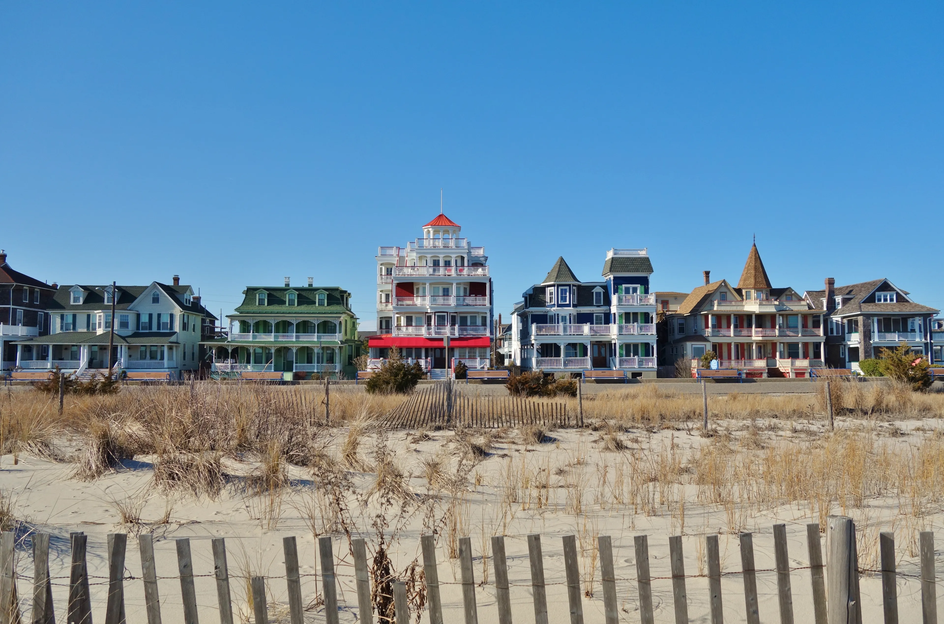 CAPE MAY, NJ -31 MAR 2018- Colorful historic Victorian houses line the beach front in Cape May, at the southern tip of Cape May Peninsula in New Jersey where the Delaware Bay and Atlantic Ocean meet. 