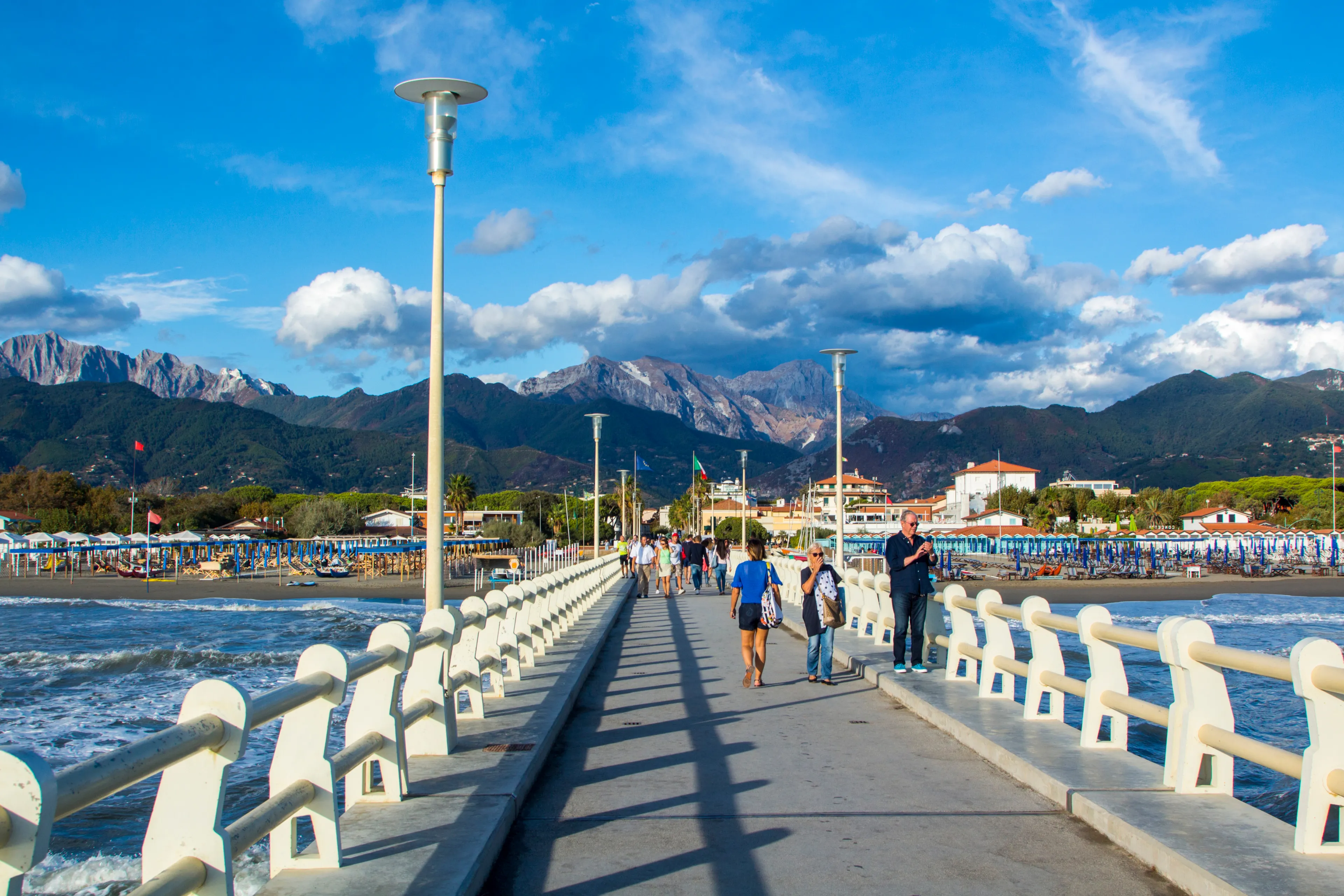 Forte dei Marmi, Lucca/Italy - Sept 2 2017: the traditional pier overlooking the sea and the Apuan Alps
