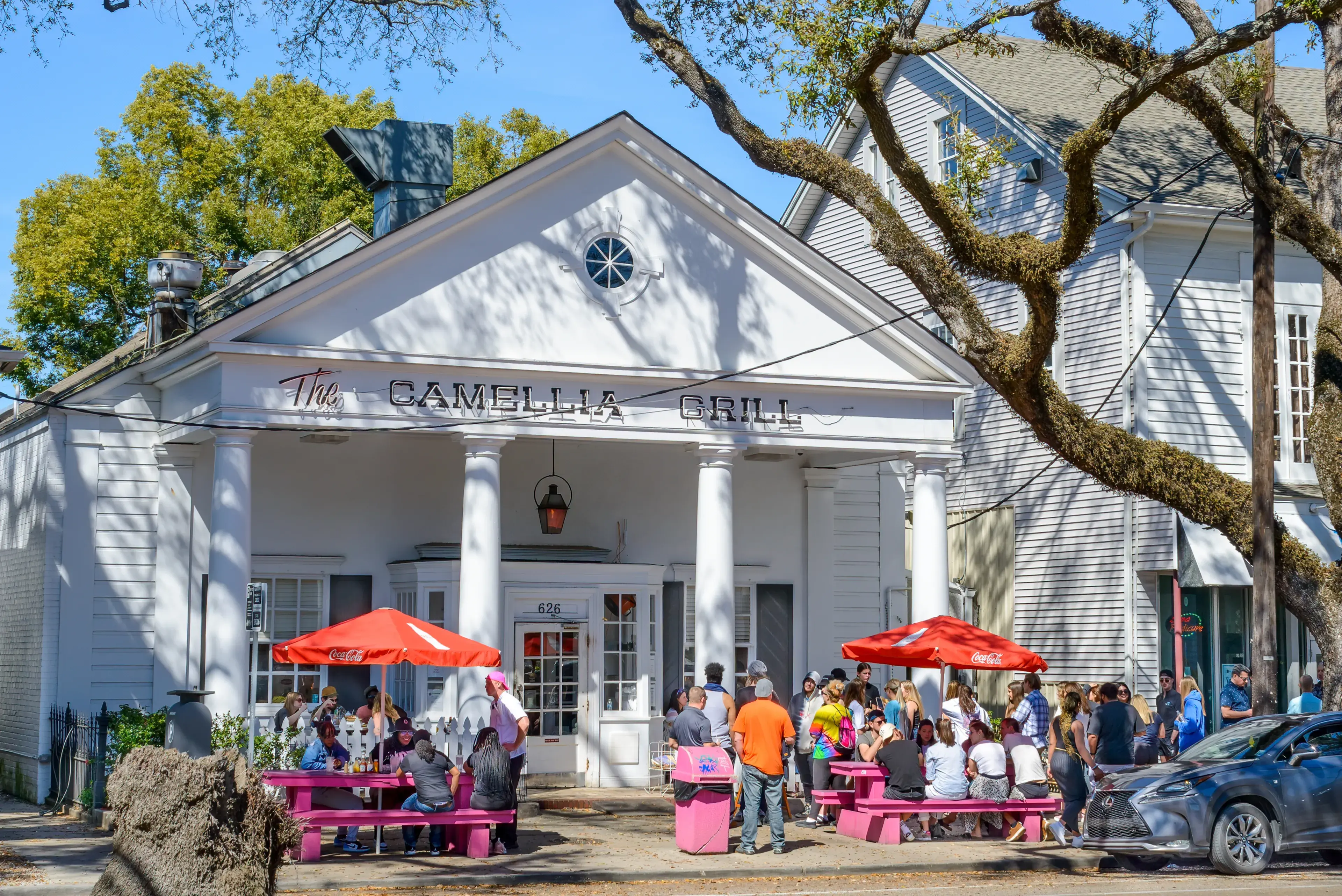 NEW ORLEANS, LA, USA - FEBRUARY 20, 2023: Camellia Grill Restaurant with line of people waiting outside NEW ORLEANS, LA, USA - FEBRUARY 20, 2023: Camellia Grill Restaurant with line of people waiting outside
