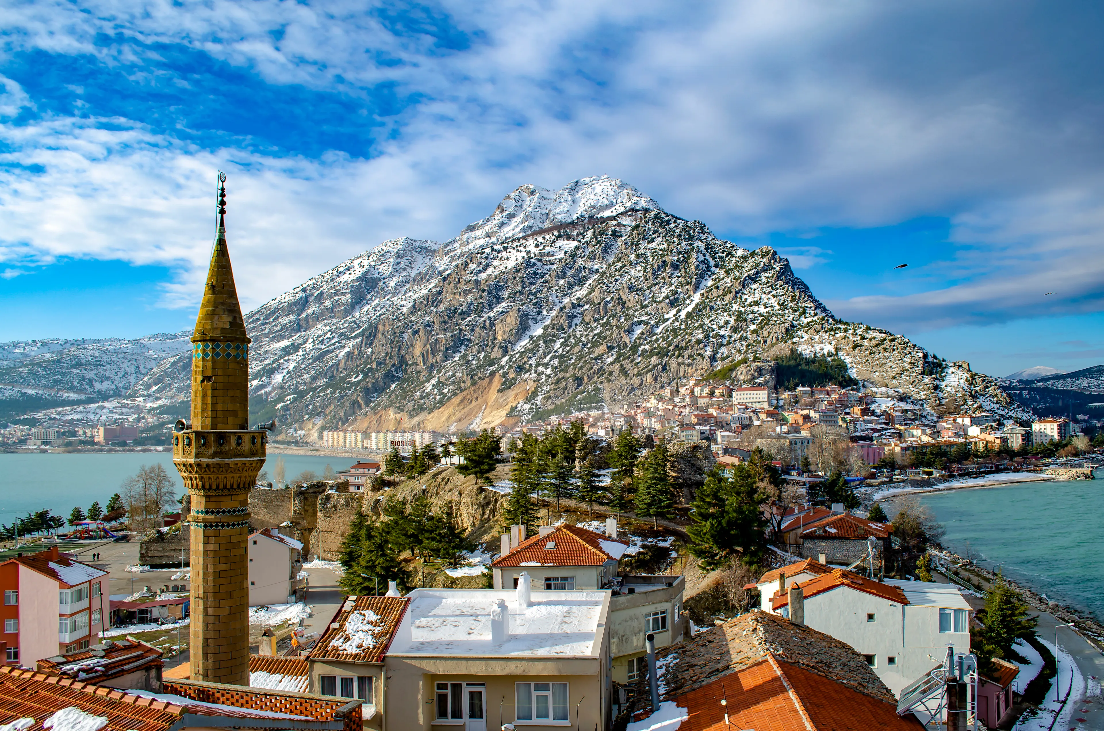 Turkey, Isparta province, beautiful Egirdir lake and Needle mountain with mosque in winter