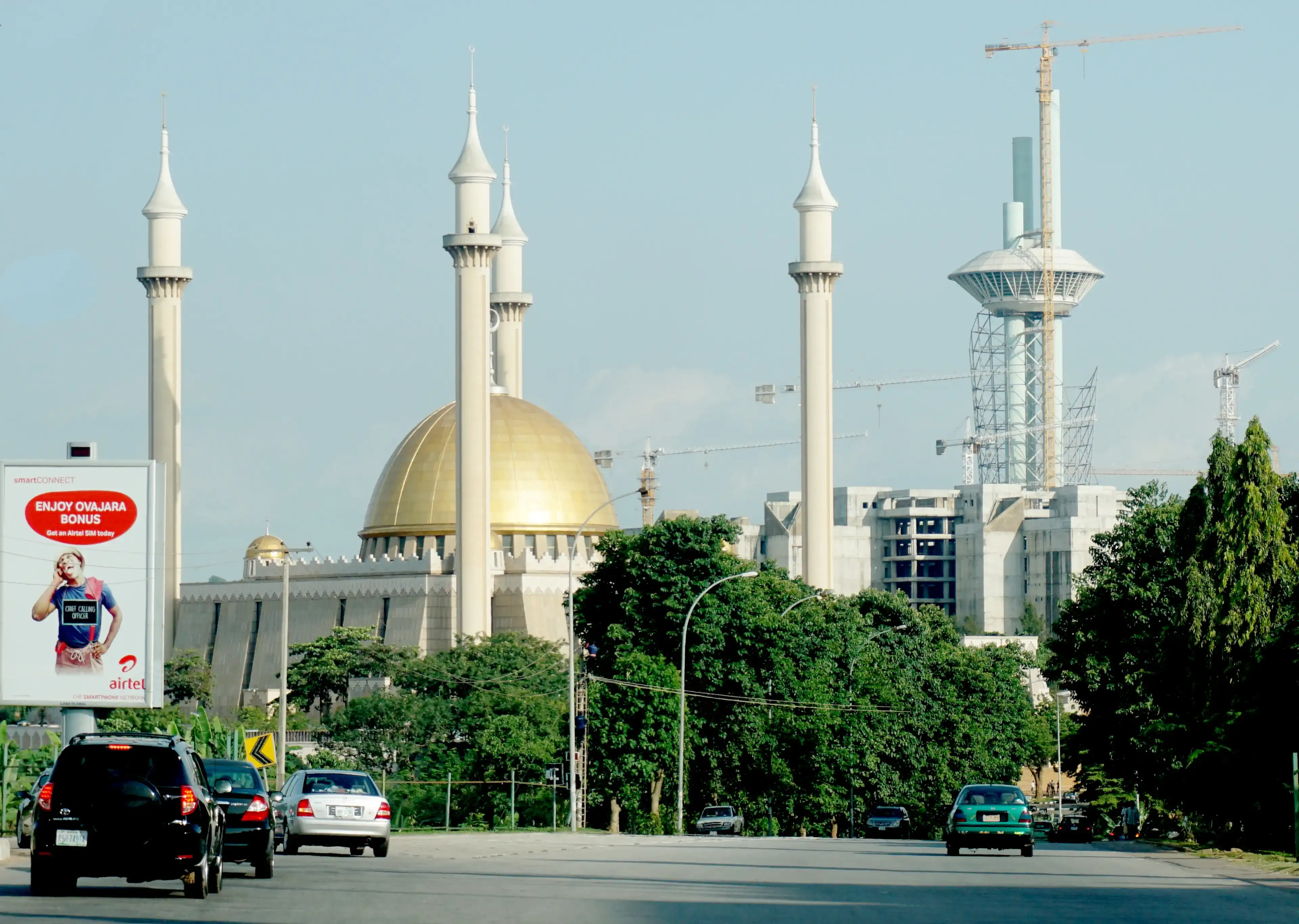 Abuja, FCT/Nigeria - May 13th, 2018: Picture focus on the Abuja National mosque in Abuja, Nigeria. It has 4 minarets and muslims pray 5 times a day. Islam is one of the main religion in Nigeria.