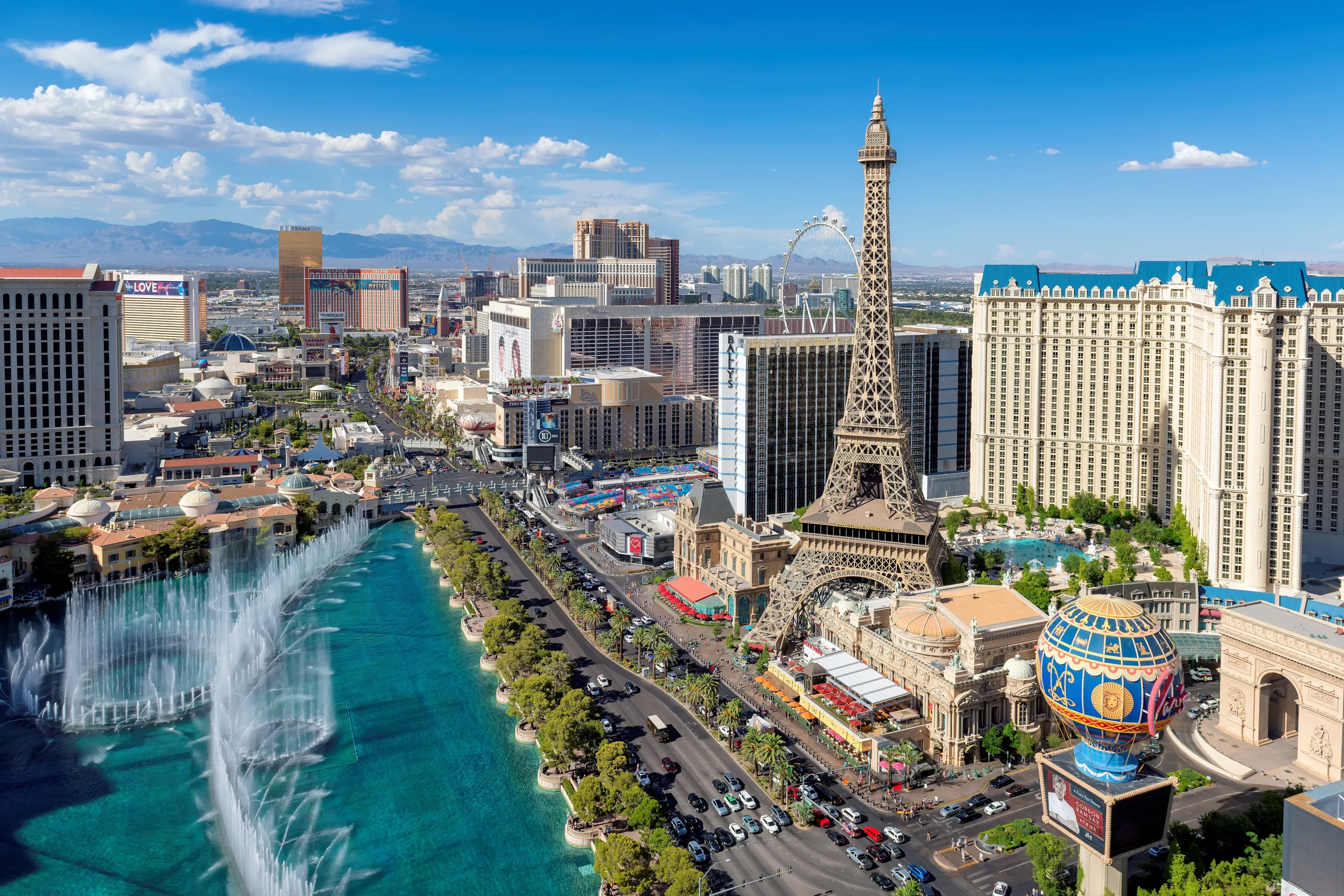 LAS VEGAS, USA - JUNE 4, 2023: World famous Las Vegas Strip in Las Vegas, Nevada at sunny day on June 4, 2023 in Las Vegas, USA. The Strip is home to the largest hotels and casinos in the world. LAS VEGAS, USA - JUNE 4, 2023: World famous Las Vegas Strip in Las Vegas, Nevada at sunny day on June 4, 2023 in Las Vegas, USA. The Strip is home to the largest hotels and casinos in the world.