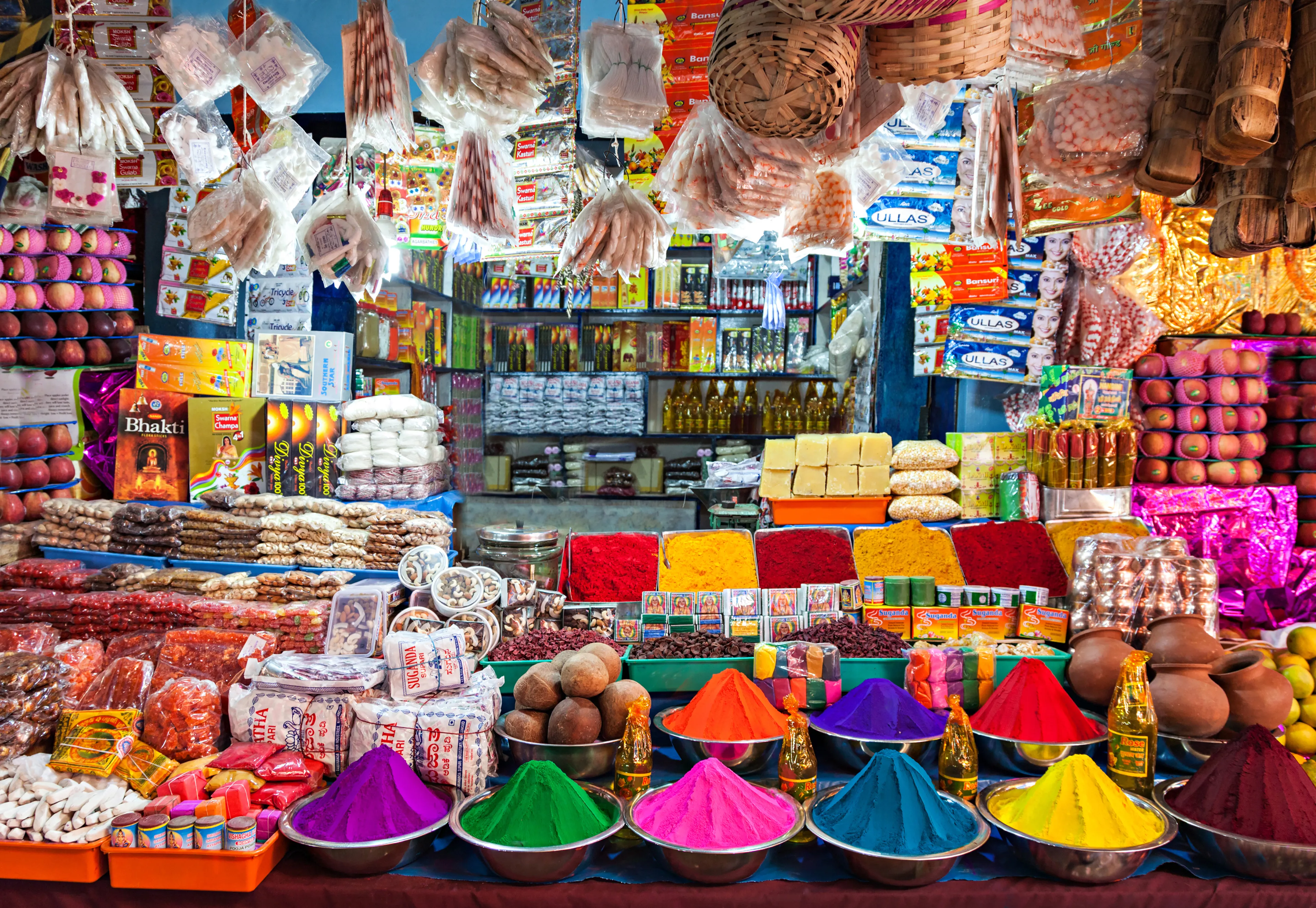 DELHI, INDIA - MARCH 26: Indian shop on March 26, 2012, Delhi, India. Small shops like this are the most common in poor region of Delhi. Tourists can see the color of India in them.