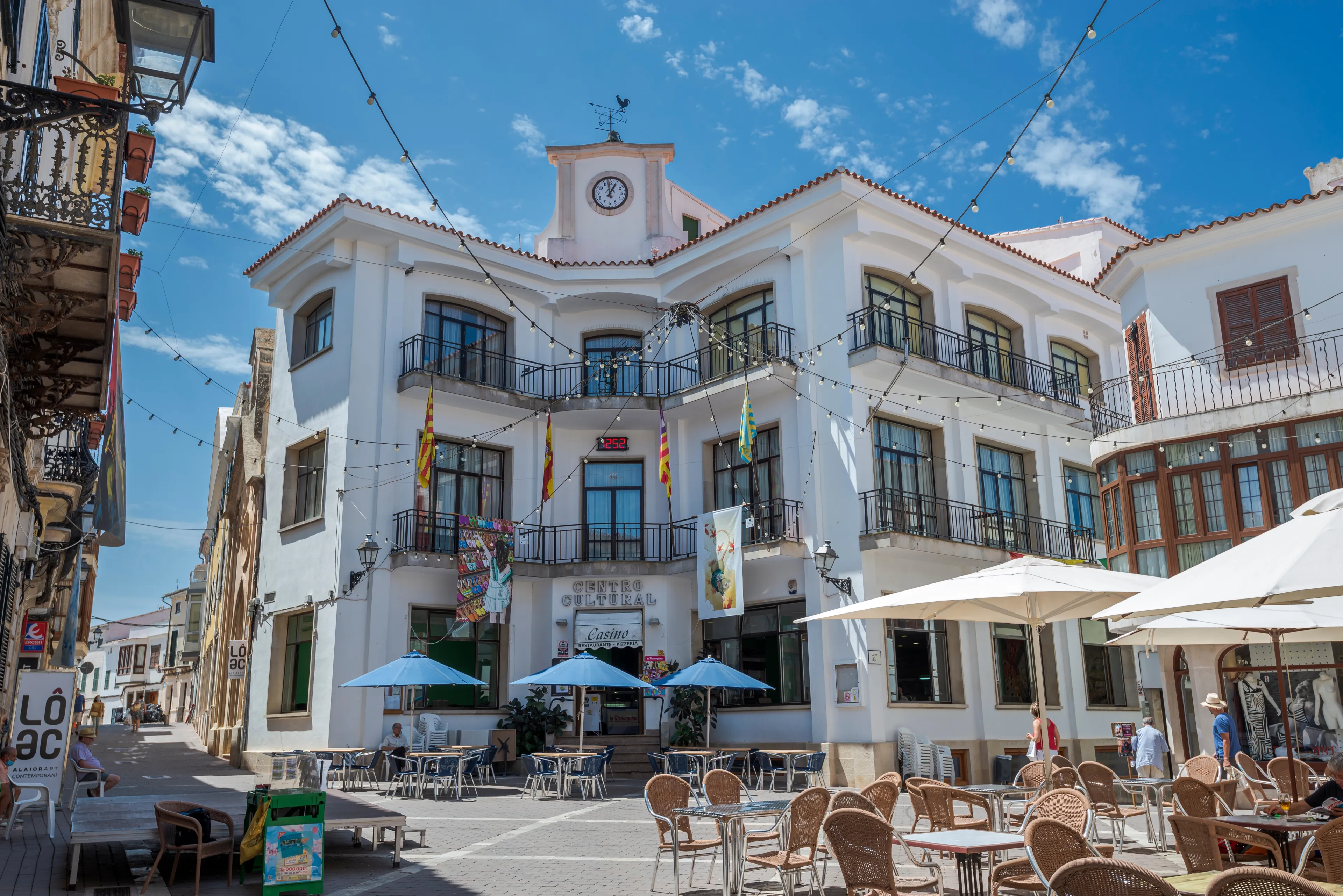 ALAIOR, SPAIN – AUGUST 3, 2021: Views of the Constitution Square in Alaior, a small city in Menorca, Balearic Islands