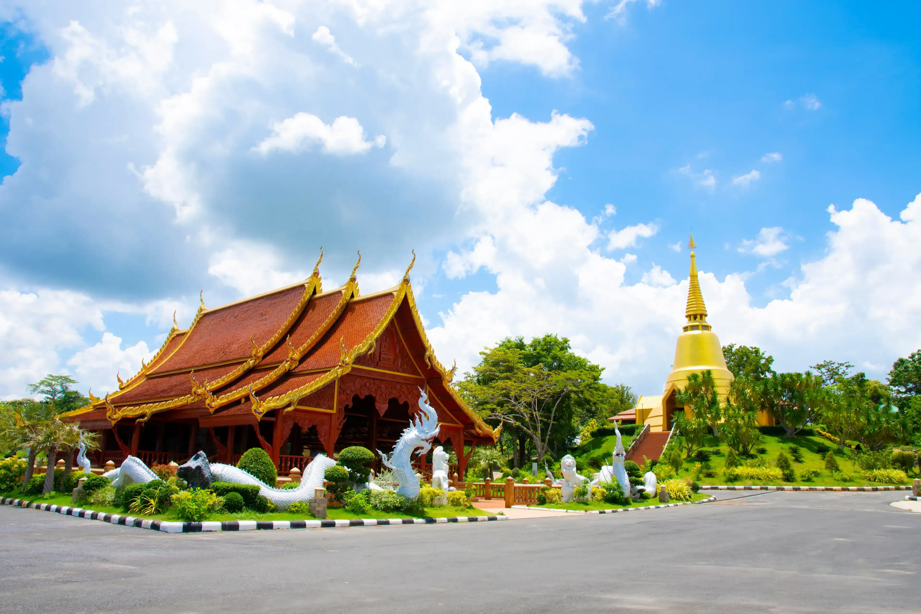 Wat Tham Saeng Phet is a Buddhist temple in Amnat Charoen, Thailand. The Thai temple has a vihara, a pagoda, and a huge reclining Buddha. Wat Tham Saeng Phet is a Buddhist temple in Amnat Charoen, Thailand. The Thai temple has a vihara, a pagoda, and a huge reclining Buddha.