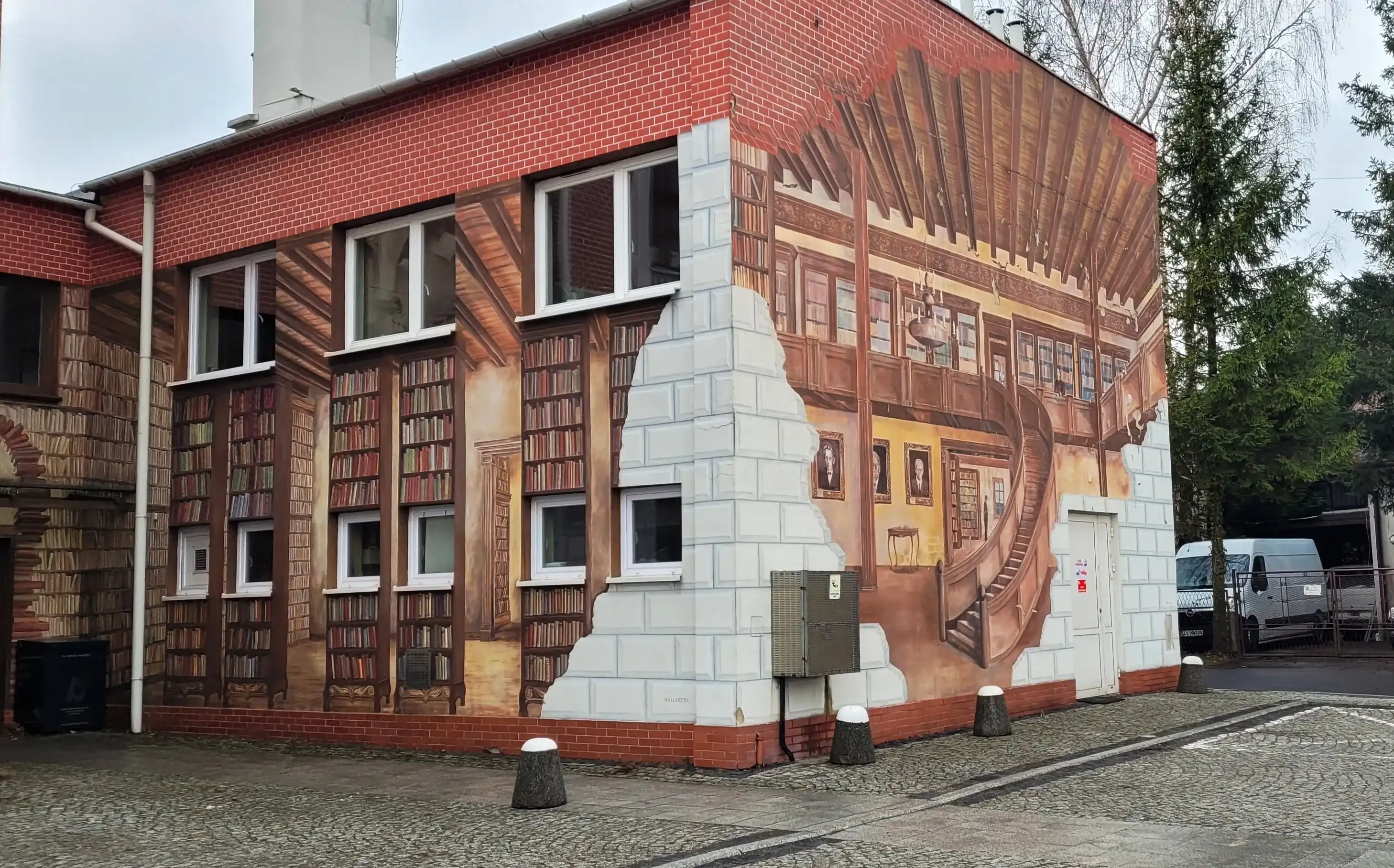 Ustroń Poland 28.01.2024 mural on the wall of the municipal library showing the library room Ustroń Poland 28.01.2024 mural on the wall of the municipal library showing the library room