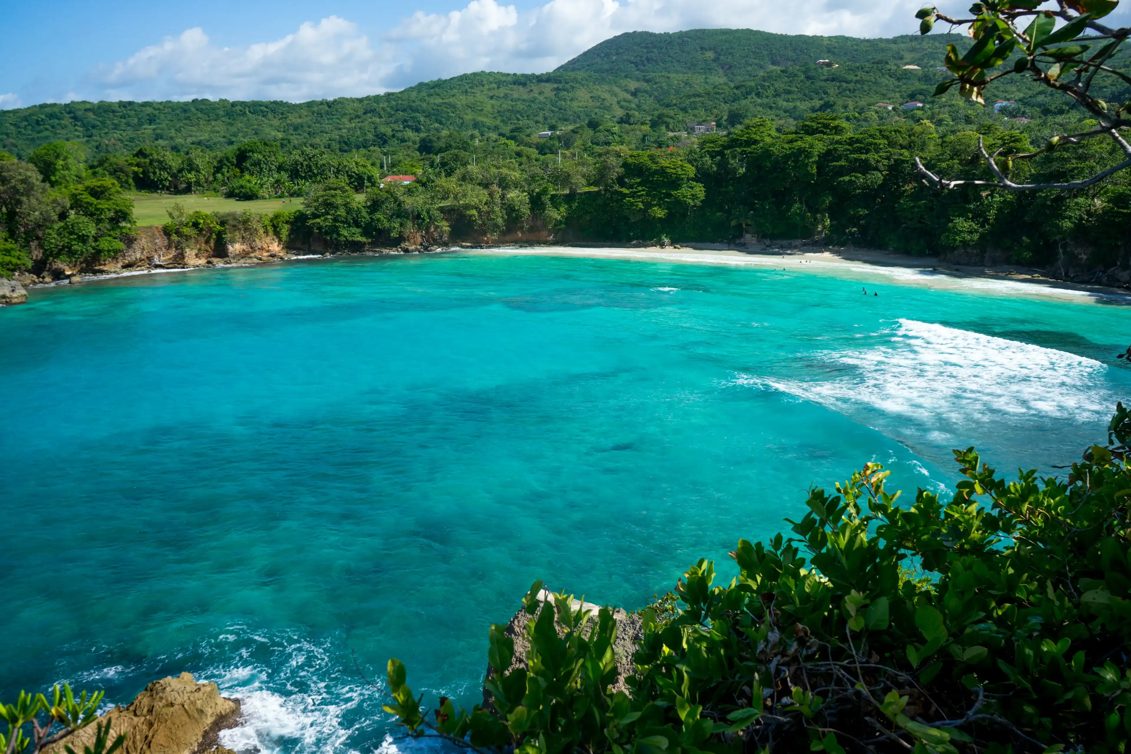 Views of the coastline and bays with turquoise water from the cliffs in Jamaica Portland