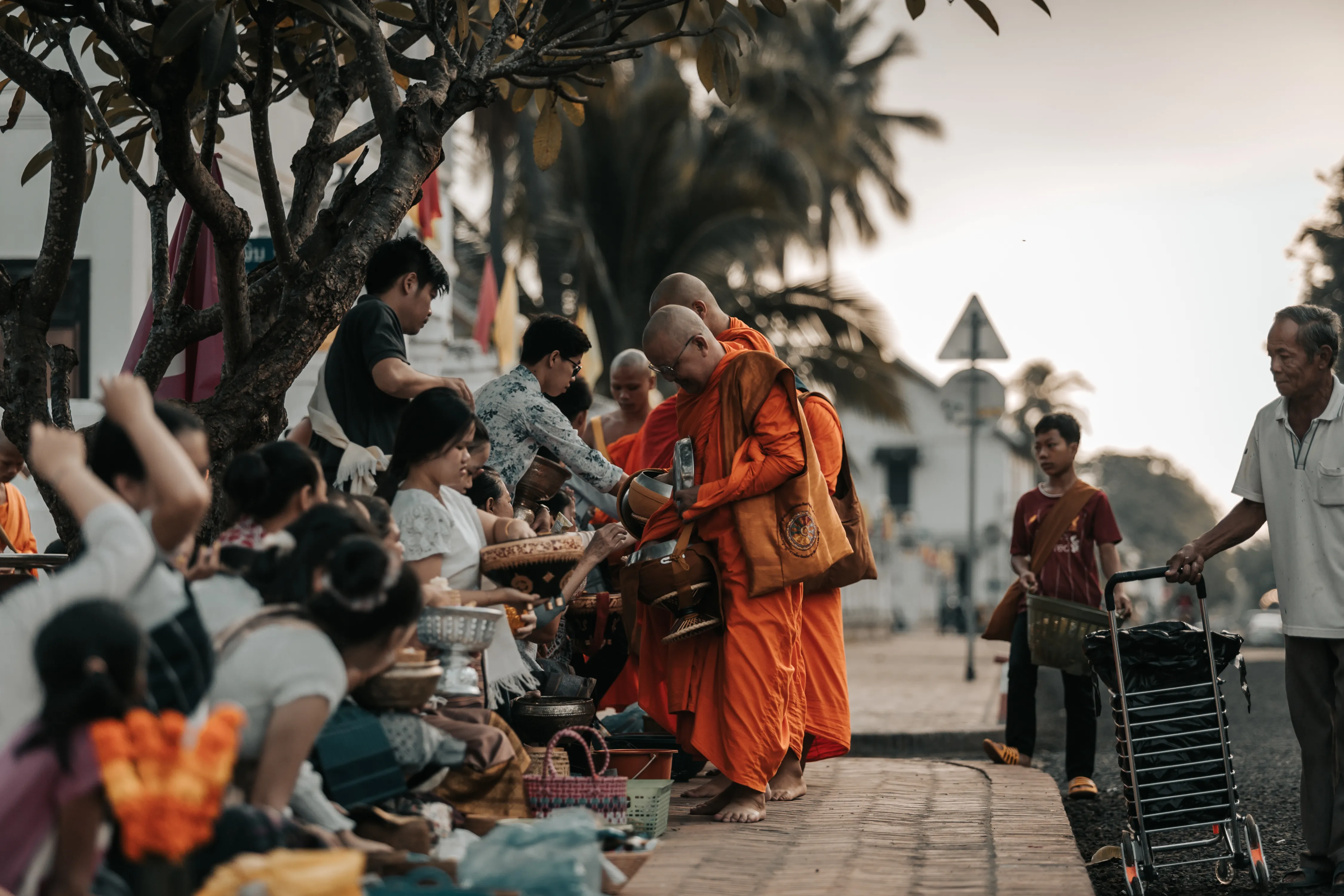 Respecting the Buddhist Alms Giving Ceremony