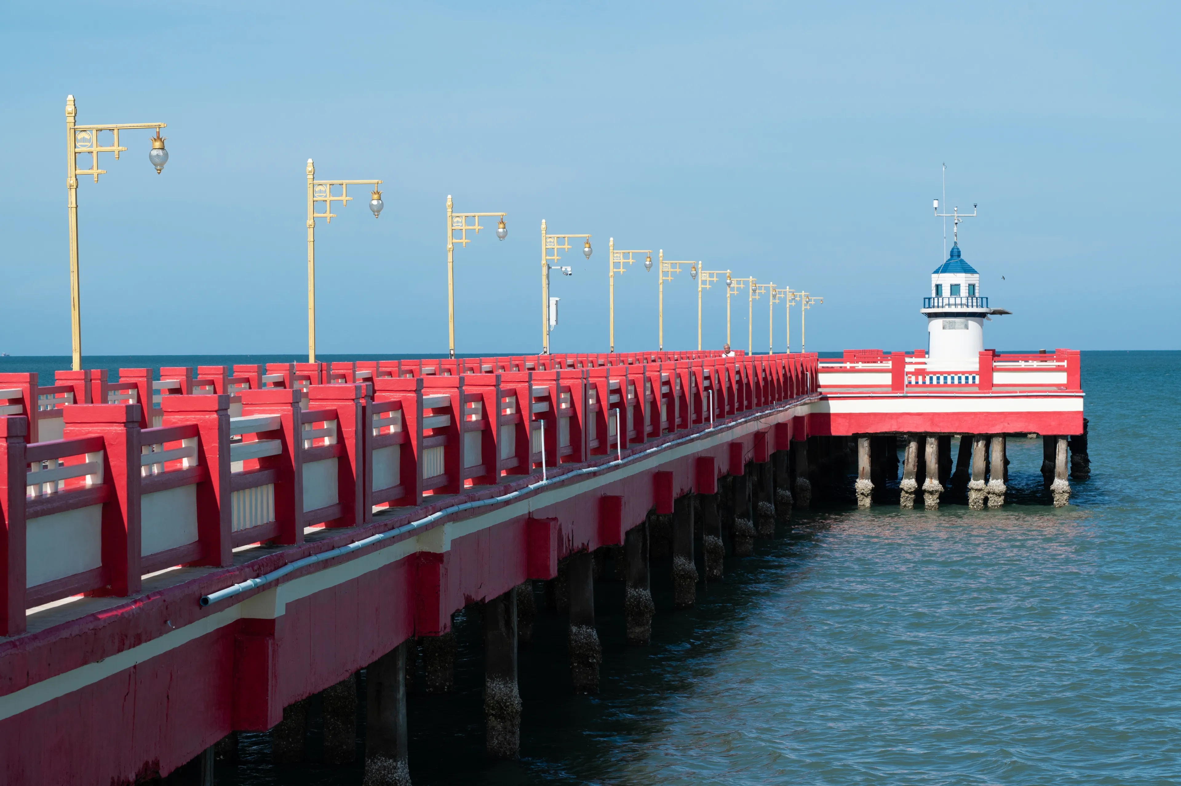 Red Bridge at Prachuap bay,Muang district,Prachuap Khiri Khan Province, Thailand. Name of Bridge is Saranvithi.Landmark of Prachuapkhirikhan province.